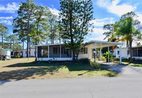 Photo of 1044 Overlook Dr, Deland, FL 32724 (MLS # V4946977)
