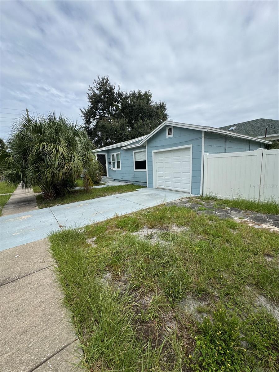 Welcome to the highly sought-after Palmetto Palms Neighborhood, where historic charm meets modern convenience. This high and dry 50' wide x 127' deep corner lot is located in a desirable non-evacuation zone, offering peace of mind and a prime opportunity to create your custom dream home with the builder of your choice. Nestled on a quiet, brick street with sidewalks and alley access, the property is framed by mature trees that offer beauty and shade, while the rear alley provides flexibility for garage placement or the addition of an Accessory Dwelling Unit (ADU) thanks to favorable zoning. Enjoy the best of both worlds: a peaceful residential setting a few steps from all the shops and restaurants along the Central Ave corridor and only a short drive to vibrant downtown St. Pete and the Gulf beaches. This is a competitively priced opportunity to invest in one of the city’s most beloved neighborhoods. Whether you're dreaming of a classic bungalow or a modern retreat, this lot is ready for you to bring your vision to life. Don’t miss your chance to create something truly special in a location that blends charm, convenience, and community. Surrounded by many new construction homes selling for $1.25M and up, the real value lies in the land and location.