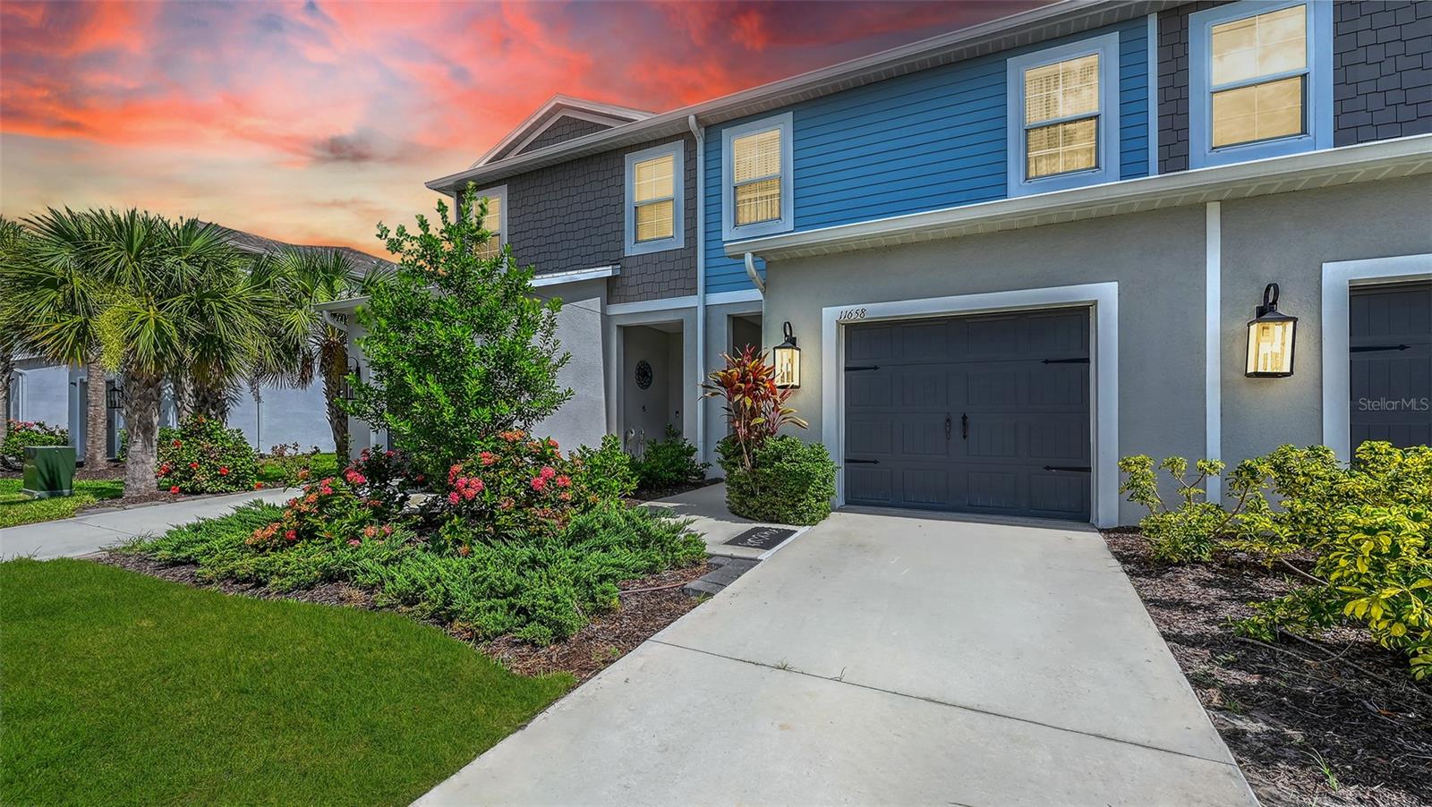 Nestled within the thriving North River Ranch community of Parrish, this elegant 3-bedroom, 2.5-bathroom townhome offers a harmonious blend of style, comfort, modern convenience and comfort with over1800 square feet of living space. Positioned at the end of a quiet cul-de-sac and overlooking a tranquil pond, the residence boasts serene water views and sophisticated design elements throughout. Once inside you will discover a beautifully appointed interior featuring brand-new carpeting, refined tile flooring, recessed lighting, and designer crystal ceiling fans. The gourmet kitchen is a culinary delight, showcasing newly upgraded stone countertops, a stylish tile backsplash, stainless steel appliances, and an expansive walk-in pantry.
Upstairs, a spacious loft provides the perfect setting for a home office, media room, or additional lounge space, complemented by a large storage closet. The luxurious primary suite offers two generous walk-in closets and a sleek, spa-inspired walk-in shower. Additional highlights include Bluetooth-enabled smart home features, a screened-in lanai ideal for peaceful mornings by the water, and an epoxy-finished garage and front entry for added flair.
Located within a secure gated community, residents enjoy access to resort-style amenities including a clubhouse, fitness center, sparkling pool, dog park, playground, and scenic walking and biking trails. North River Ranch is one of Parrish’s most sought-after master-planned neighborhoods, known for its rapid growth, family-friendly atmosphere, and top-rated schools. This is a rare opportunity to own a low-maintenance home in a flourishing location—schedule your private tour today.