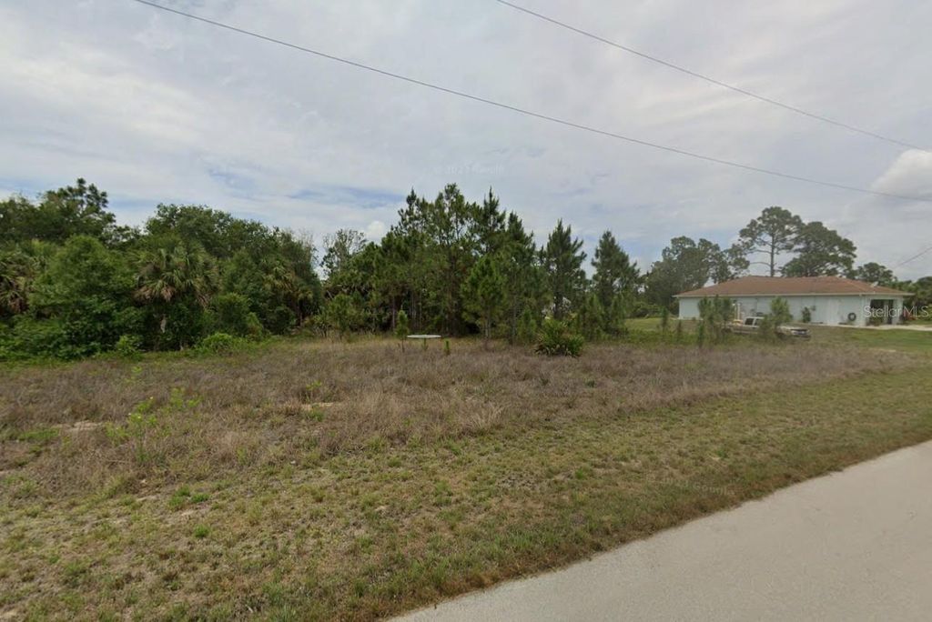 Photo of 748 Bianca Avenue S, Lehigh Acres, FL 33974 (MLS # C7522456)