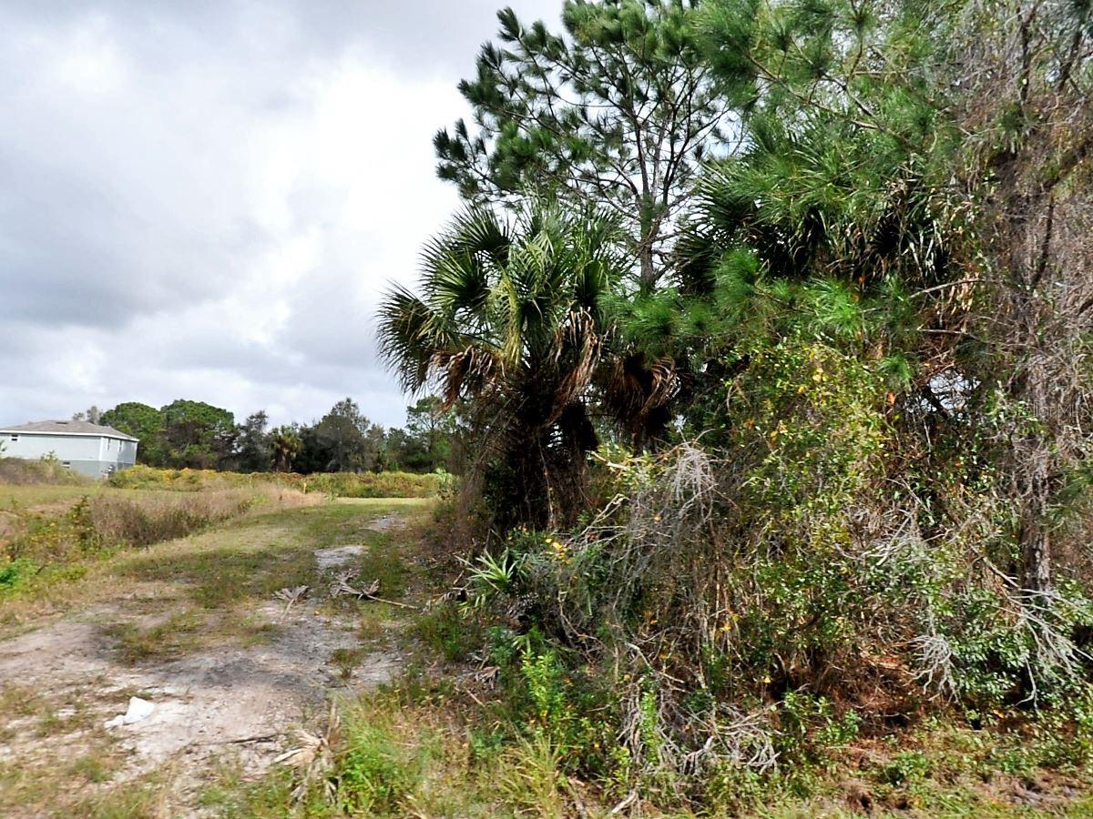 No HOA, deed restrictions or CDDs! This is a beautiful lot in a GREAT LOCATION in North Port! Are you ready to build your dream home? Look no further this 0.23 acre of land is just waiting on you! North Port is the 7th largest land mass in Florida-the 110th largest in the country!! The growth and potential are absolutely amazing. Conveniently located to shopping, dining, parks, and all that up-and-coming North Port has to offer (where so much of the city is new and still being built!) including the new Braves Spring Training Stadium! Many beaches located within a 35 minute drive from this lot. New construction is everywhere you look and you can be part of the action. Information about local builders is available upon request. At this price, this lot will sell quickly - give me a call today to place an offer and start living the Florida life!
