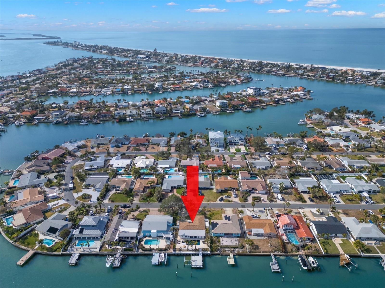 Elevated at 9.8 feet (garage at 9.3), this home offers peace of mind with no flooding from recent hurricanes and combines modern elegance with effortless functionality.
Experience the pinnacle of coastal luxury in this meticulously remodeled 3-bedroom, 2-bathroom waterfront gem in the heart of Vina Del Mar, St. Pete Beach.
Step into the brand-new kitchen, a culinary dream featuring premium Cafe appliances, a massive kitchen island with abundant storage, and stylish lighting fixtures. The entire home has been rewired and updated with high-end fixtures, complemented by new luxury vinyl flooring throughout. A Generac whole-house LP generator ensures uninterrupted comfort, while the new LP tankless water heater and completely replaced plumbing provide ultimate convenience.
The spacious master suite is a sanctuary, boasting designer closets and a spa-inspired ensuite bathroom with new tile and luxury fixtures. The office/third bedroom includes custom-built cabinets, offering ample storage. All openings, including the front door, garage door, sliders, and laundry room door, are impact-rated for safety and durability.
Outside, discover a private waterfront haven. The property features a new seawall, an updated dock with a boat lift, and a 50-amp electric system for shore power—ideal for boating enthusiasts. The pool, complete with advanced heating technology, ensures year-round relaxation, while lush new landscaping creates a serene oasis.
This golf cart-friendly community offers easy access to Vina Del Mar Park, which features a variety of amenities including small and large dog parks, tennis and pickleball courts, basketball, a fenced-in playground, a fitness area, and a covered picnic shelter.
Perfectly situated along a tranquil canal, this home is moments from pristine beaches, vibrant attractions, and fine dining, making it an entertainer’s dream or a peaceful retreat. Deep water access and dock for large boats and shore power on dock. With no expense spared, this showpiece is freshly painted inside and out, move-in ready, and waiting to welcome you.
Schedule your private showing today and make this breathtaking waterfront paradise your own!