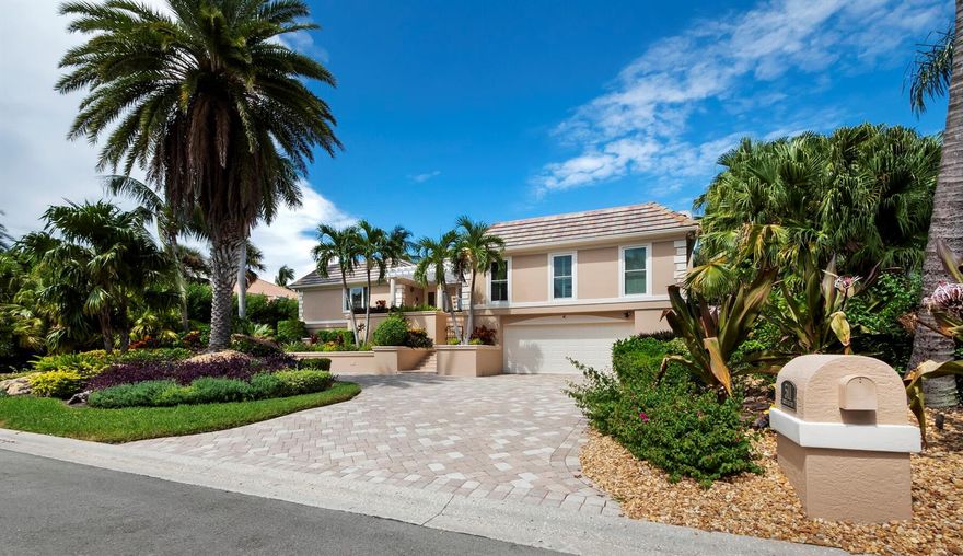 A nautical haven awaits with this impressive 3BR/3.5BA residence in the Harbor, one of the finest single-family communities on Longboat Key with just 67 home sites. The spectacular setting begins at your approach, where an elegant paver drive is enveloped by lush landscaping and leads to the stately stepped entryway. As you pass the threshold, you’re greeted by diamond-style travertine floors, lofty ceilings and an expansive living space filled with natural light. The family room, complete with a gas fireplace, provides a cozy retreat for relaxation and gatherings. The beautifully redone kitchen makes an exceptional heart of the home, with rich, dark wood cabinetry to complement the white quartz countertops, stainless-steel appliances, large center island, subway tile backsplash and perfectly positioned windows to frame your tranquil canal views. A sumptuous escape, the primary suite boasts a fireplace, a sitting area, access to the terrace, oversized walk-in closet, and an opulent primary bath with spa tub, walk-in shower and separate water closet. This property is a boater's paradise, featuring 100' of association-maintained seawall frontage, a new Trex dock, boat lift and jet ski lifts, providing easy deepwater access to Sarasota Bay and the Gulf beyond. Additional highlights include a distinctive French-style roof, an oversized 4-car garage, an exercise room and a car enthusiast’s dream voluminous garage with room for multiple vehicles. The Harbor is set within prestigious Bay Isles and affords residents all the amenities and privileges of this world-class community including deeded beach access and membership in the private Bay Isles Beach Club