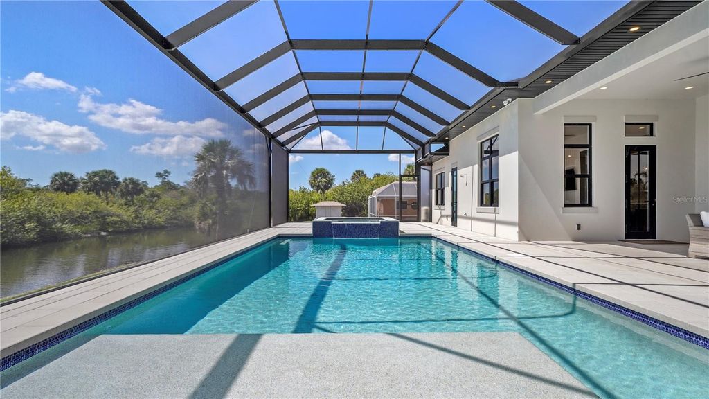 Photo of 14547 Pittenger Avenue, Port Charlotte, FL 33953 (MLS # A4686379)