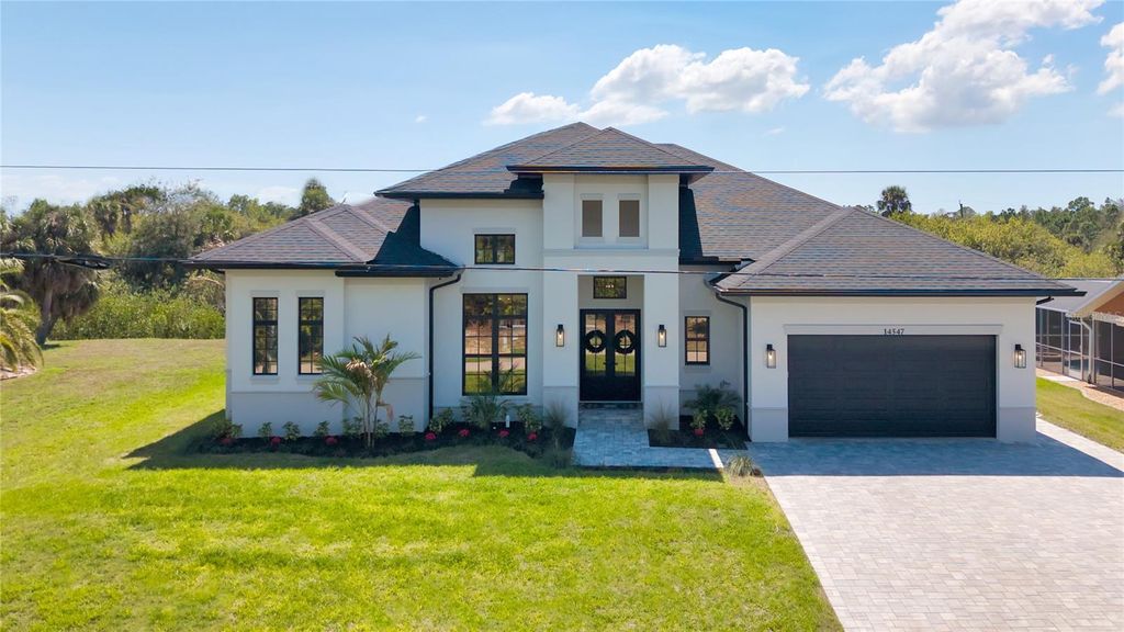 Photo of 14547 Pittenger Avenue, Port Charlotte, FL 33953 (MLS # A4686379)