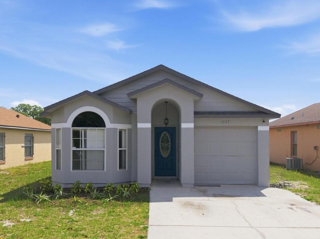 Photo of 1537 Ridge Pointe Drive, Orlando, FL 32808 (MLS # O6403717)