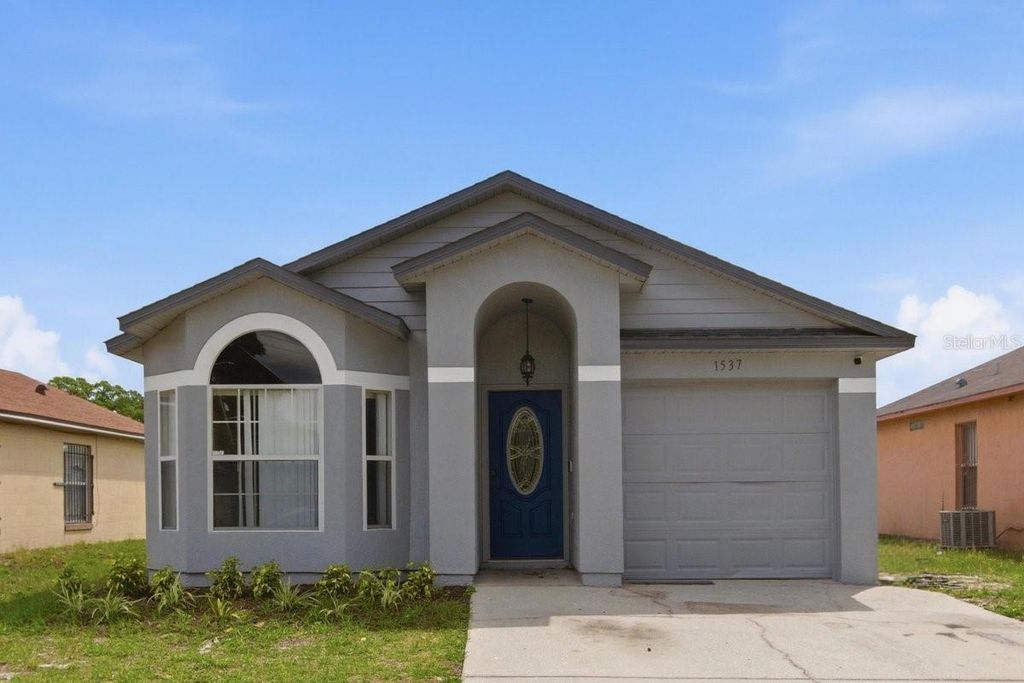 Photo of 1537 Ridge Pointe Drive, Orlando, FL 32808 (MLS # O6403717)