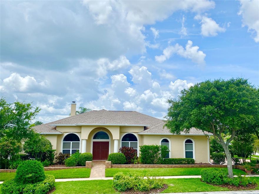 Situated on a high corner lot in the private enclave of single-family homes in Villa Way, within the Minorca development on North Beach, lies the perfect custom-built Johnson Group home. This one-owner home has been meticulously maintained, including new roof, gutter and downspouts in May 2020! When you arrive at the property you’ll notice the intricate paver driveway, walks, patios & landscape walls that frame an assortment of mature trees & plantings.  Enter into the home's gracious foyer, flanked by the dining room & family room, boasting a fireplace, 12’ volume ceilings and a wall of sliders overlooking the screened patio. There’s also a large office (or hobby room) with built-ins. The eat-in kitchen is open to the family room w/ access to the dining room and has a mitered glass window to enjoy the private view. The kitchen is outfitted with maple glazed wood cabinets & freshly polished Corian counters, newer stainless steel Kitchen Aide appliances and tile backsplash. The large master opens to the screened porch, has 2 large walk-in closets (one is a safe room) w/ built-ins and an ensuite master bath with double vanity, garden tub and separate shower. This split plan home has 3 additional bedrooms, one of which has its own bath and access to a patio. The 3rd bath is a hallway guest bath. All bedroom closets come with built-in organizers. The laundry room has built-in cabinets/counter, utility sink and brand new high-end washer and dryer that convey with the home. The 2-car garage floor has a fresh concrete-stained finish and built-in storage. Other features include top-of-line Carrier Infinity AC (1.5 yrs old) with UV light and a reverse osmosis system. The HOA fee is low and encompasses membership to Minorca amenities: beach access, fishing pier, clay tennis courts, community pool and clubhouse, complete with state-of-the-art fitness center, saunas, billiards and more. Villa Way also has a convenient sidewalk easement to Ocean Drive for a 2nd beach access. ;Water: City