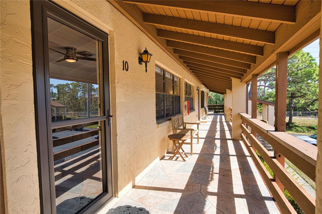 Photo of 23 Quails Run Boulevard #23203, Englewood, FL 34223 (MLS # TB8457809)