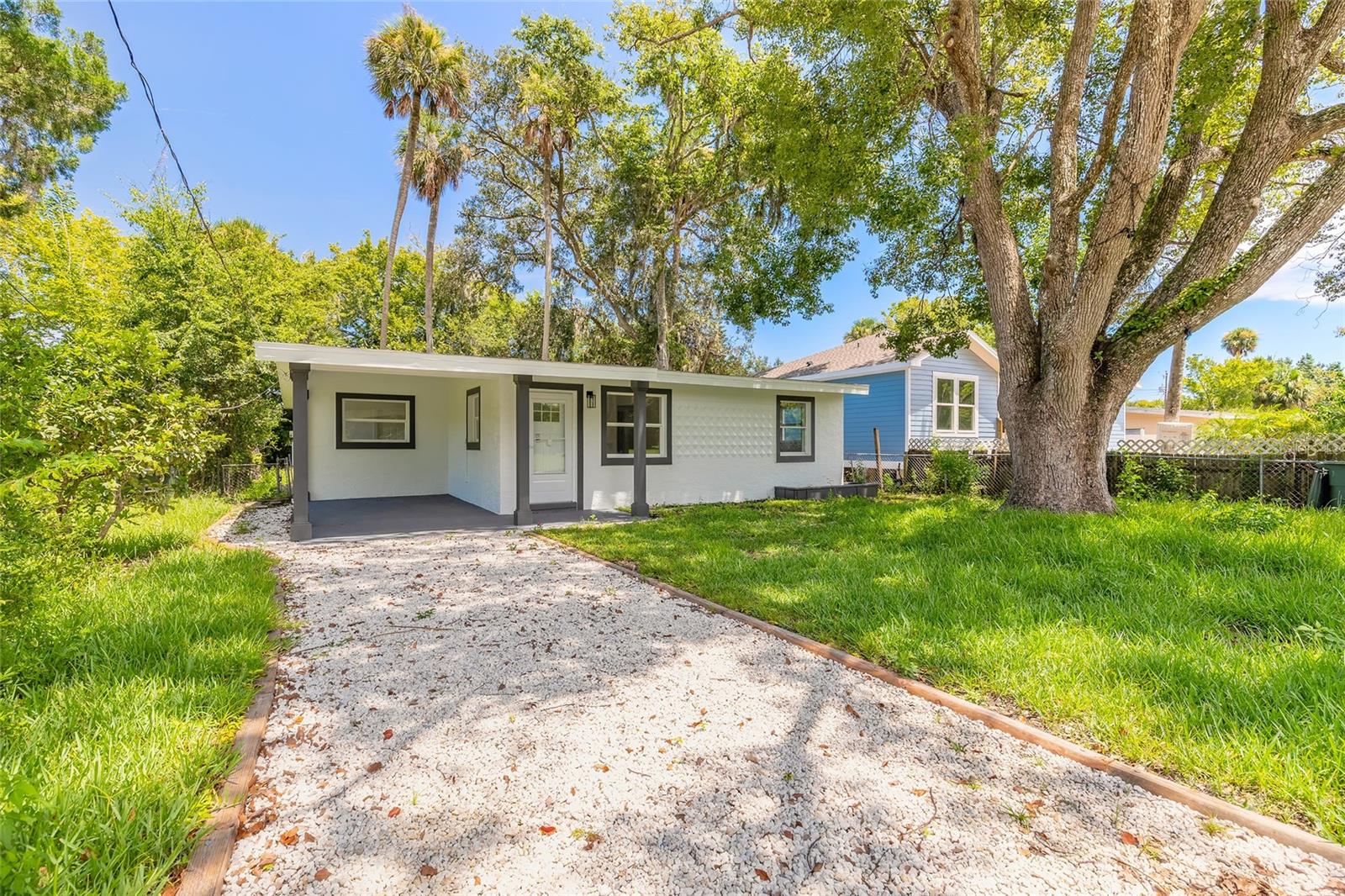 Located in the Economical Redevelopment Zone, this home may qualify for special financing—potentially up to 100 percent financing with no PMI. Perfectly tucked away on a peaceful street, this beautifully renovated 2-bedroom, 1-bath residence blends modern style with everyday convenience. Step inside to a fully reimagined interior, where fresh finishes and thoughtful upgrades set the tone. The brand-new kitchen shines with sleek cabinetry, contemporary countertops, and all-new appliances—including a washer and dryer for added ease. Luxury plank flooring flows seamlessly throughout, complemented by upgraded lighting and designer touches that create a bright, welcoming atmosphere. The open-concept layout is ideal for both relaxed living and entertaining, while the spa-inspired bathroom offers a touch of everyday indulgence. Both bedrooms provide cozy, inviting retreats with ample closet space. Outside, enjoy added privacy with no homes directly across the street and a vacant lot next door, all while being just minutes from Daytona’s world-famous beaches, vibrant shopping, dining, and entertainment. Whether you’re looking for a primary residence, a vacation getaway, or a savvy investment, this move-in-ready gem delivers coastal charm, modern comfort, and unmatched location. All information deemed accurate but cannot be guaranteed.