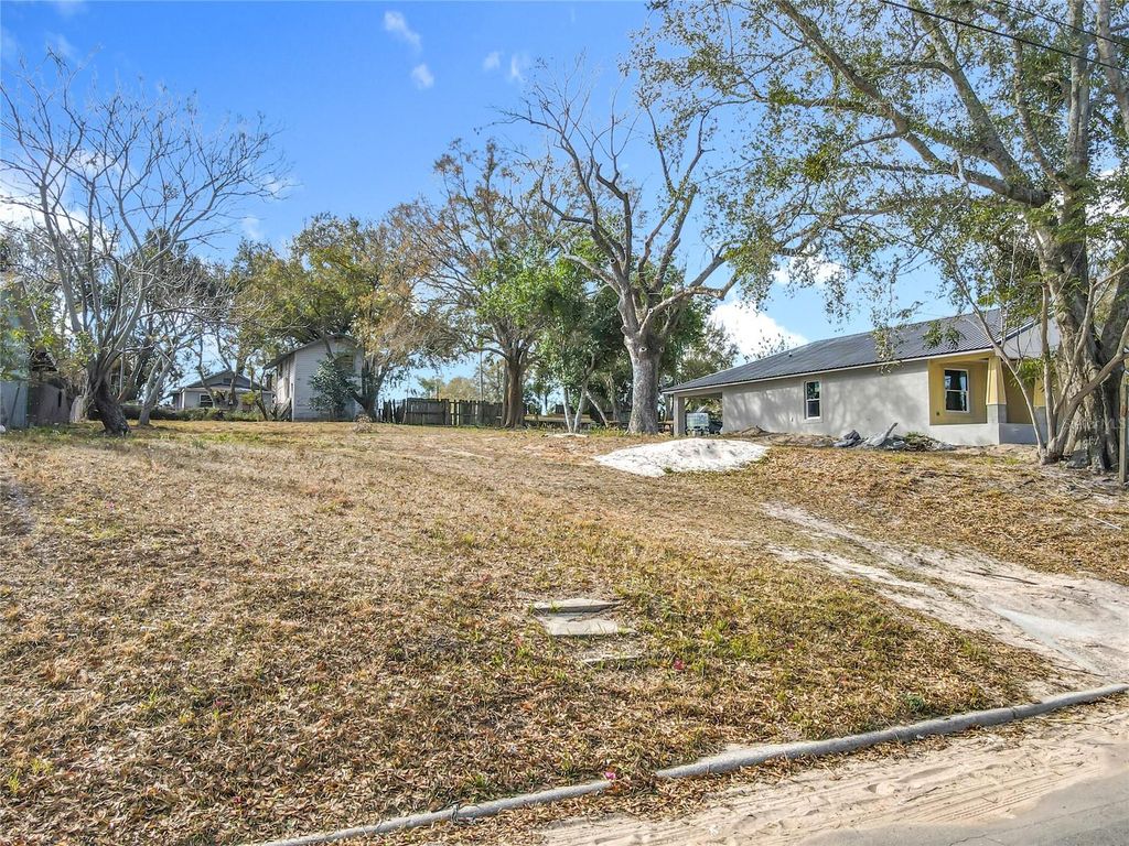 Photo of 309 Weaver Avenue, Lake Wales, FL 33853 (MLS # G5107798)