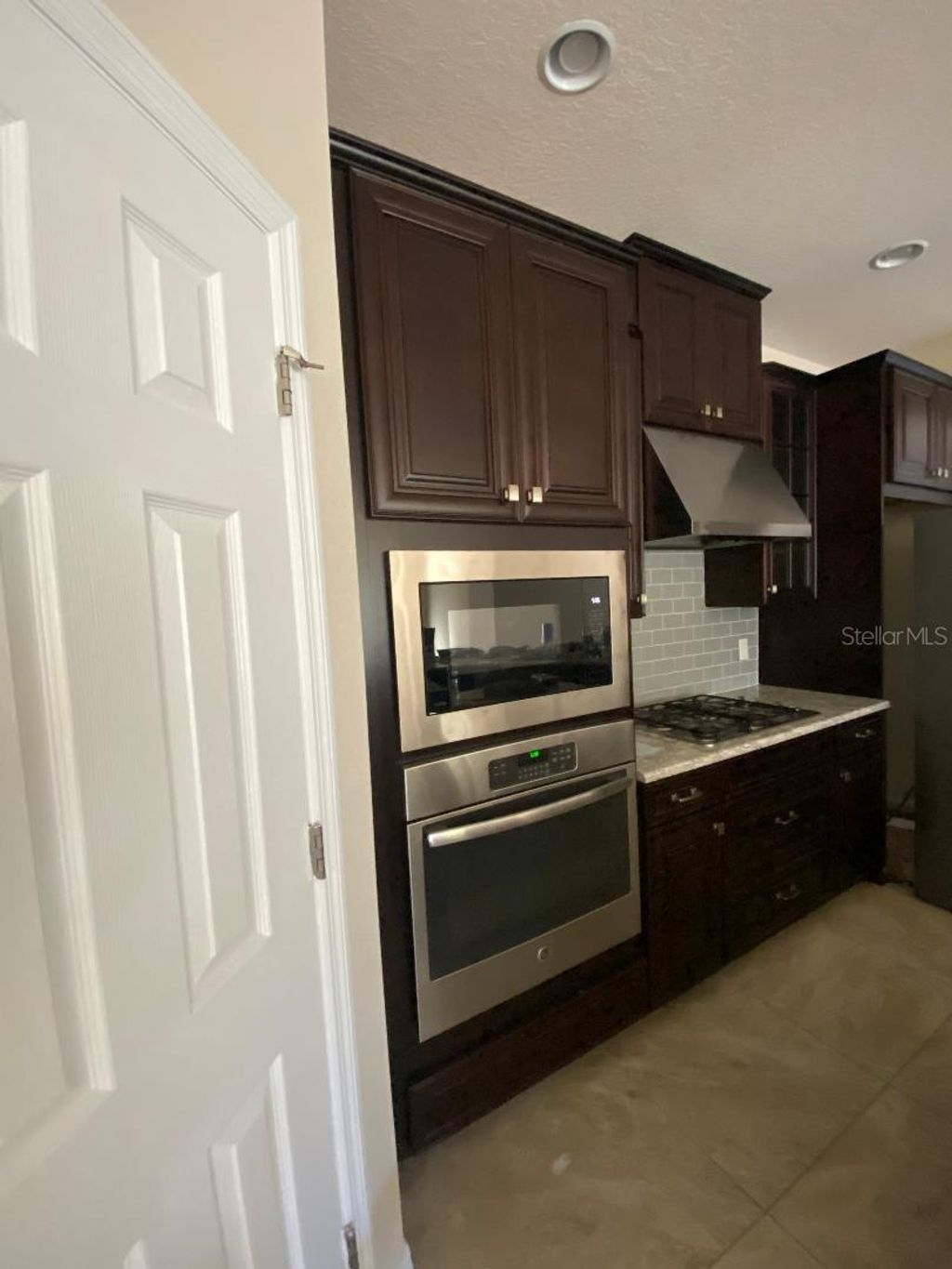 Photo of 8838 Citrus Palm Drive, Tampa, FL 33626 (MLS # TB8442522)