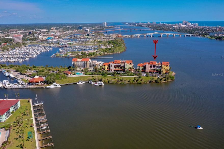 Experience waterfront living at its finest in this stunning 3-bedroom, 2-bath end-unit residence in secure Marina Point. Perfectly positioned directly on the Intracoastal Waterway, this exceptional condo offers breathtaking panoramic views of the river, marinas, Marina Point boat slips, and the iconic Veterans Memorial Bridge — beautifully illuminated in orange each evening. By day, enjoy endless scenery of dolphins, manatees, seabirds, yachts, and passing boats; by night, the sparkling city lights and reflections create an unforgettable backdrop. Designed to maximize the spectacular water views, the open floor plan features a spacious living area, wet bar, sunroom that feels like you’re aboard a luxury cruise ship, and two private balconies — one off the primary suite and another from a guest bedroom. The large kitchen offers Intracoastal views from the breakfast area, along with a pantry featuring pull-out shelving and a beverage cooler for effortless entertaining. Additional highlights include two side-by-side secure underground parking spaces with a storage cabinet, bicycle storage, ample guest parking, car wash area, and dog park. Residents enjoy a riverfront clubhouse and pool in this gated marina community. Boating enthusiasts will appreciate the availability of deep-water boat slips ($500 annually for boats up to 30 feet and $1,000 annually for larger boats, when available, with waiting list options). Ideally located near the revitalized downtown Daytona Beach riverfront, you can walk to the Chart House, Yacht Club, restaurants, museums, art galleries, shops, and the multi-million-dollar Riverfront Esplanade. Just minutes from the beach, Daytona International Speedway, Daytona International Airport, and Pictona’s world-class pickleball complex, with easy access to Orlando, Jacksonville, Tampa, St. Augustine, the Space Coast, and beyond. Recent building improvements include resurfaced balconies, new balcony railings, new tile roof, concrete restoration, new walkways, exterior painting, and plumbing upgrades — offering peace of mind and exceptional value. 3 – months minimum rental.