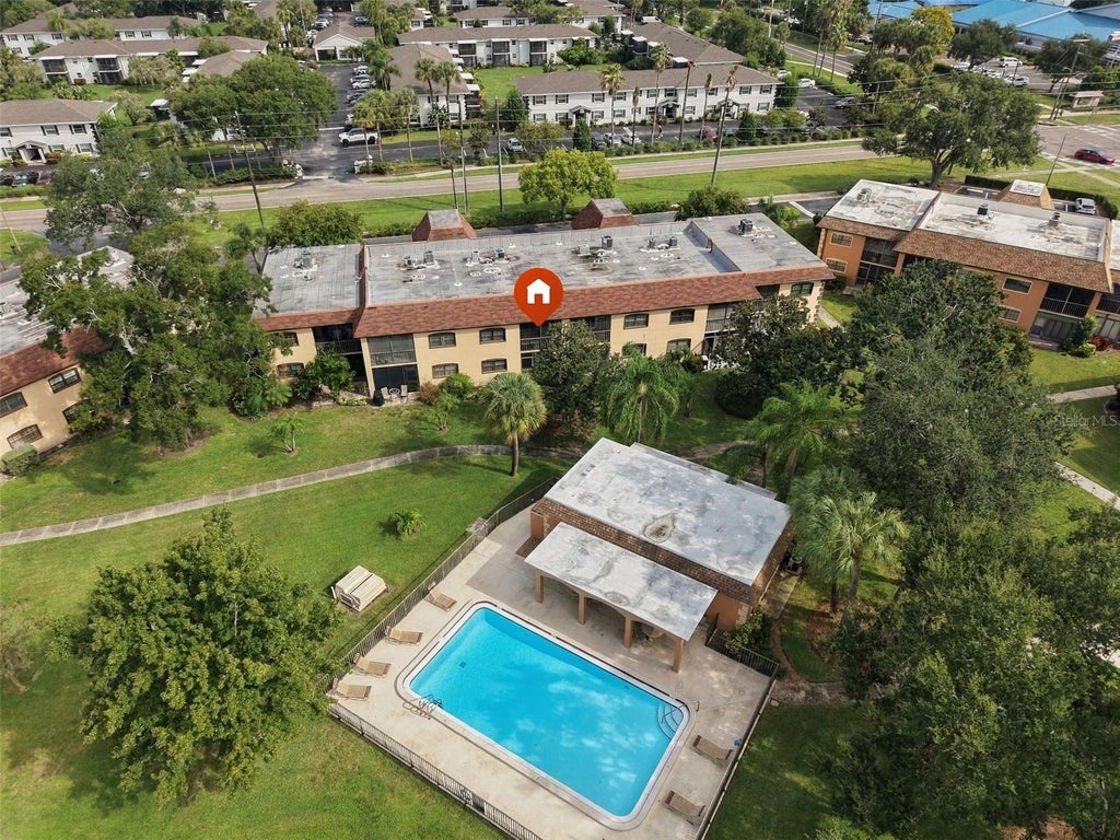 Photo of 12900 Vonn Road #E204, Largo, FL 33774 (MLS # TB8556072)