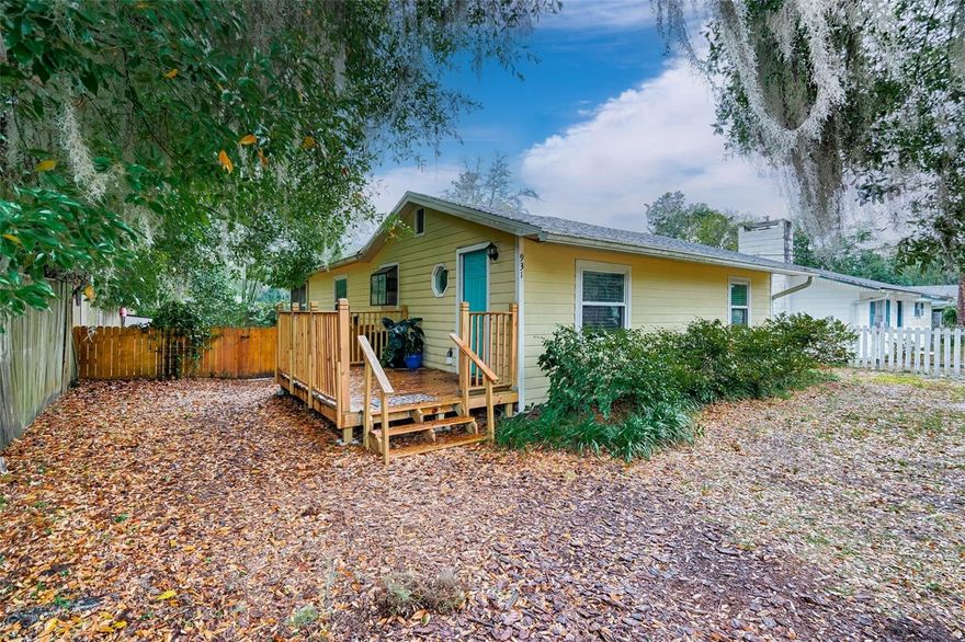 Everything you need in one neat package right here! This well-maintained 1930s bungalow, located in the popular Stephen Foster neighborhood is move-in ready and waiting for you to unpack! With no HOA and a wonderful central location, large backyard with a garden and trickling pond, it is both peaceful and convenient. In 2020 this home received a new HVAC, windows, dishwasher, and microwave. A NEW roof and hot water heater were installed in 2023. There is a cute front deck welcoming you into the home which is a 3/2 with a split plan. The primary bedroom is unusually large with an en suite bathroom. There is a dining area as well as a living room as the layout of this home truly maximizes its square footage! At the rear of the home there is a laundry/utility room that opens onto a massive screened back porch as wide as the house. The backyard features a small pond and raised garden beds, all neatly landscaped for gardening. There are two sheds for storage in the fully fenced backyard as well. This well-kept house is in excellent condition and is waiting for a new owner!