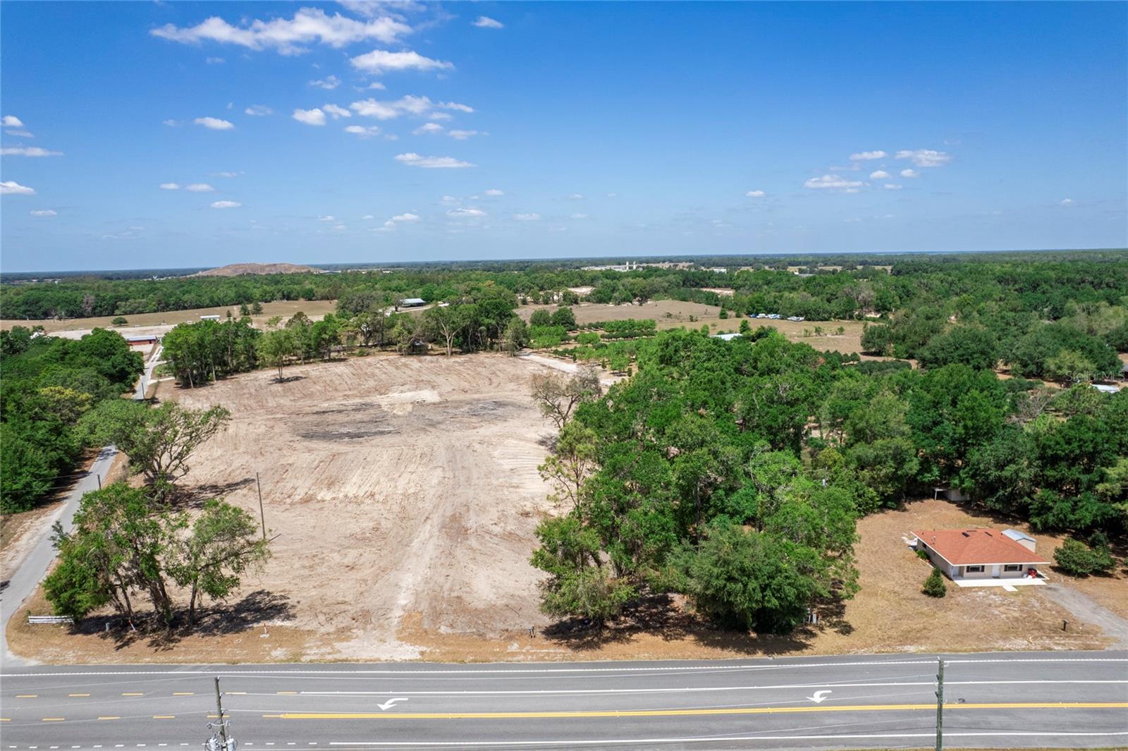 Nice-sized parcel for a commercial enterprise - lying across US 301 from Langley Medical Center. High and dry property in a central location to The Villages expansion, with easy access to I75 and the FL Turnpike. Swiftly growing area of Sumter County.