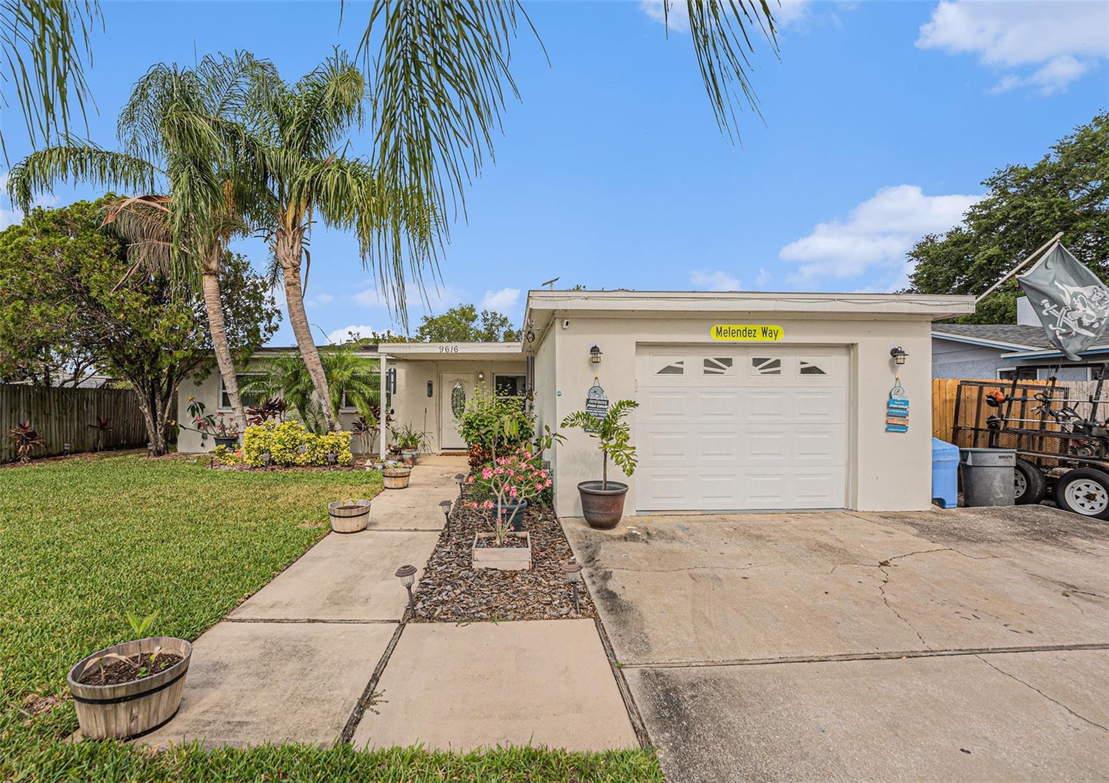 This large 4 bedroom, 3 bath, pool home in Pinellas Park has a split floor plan with kitchen open to the living and dining area. The kitchen features granite counters with breakfast bar, soft close cabinets, stainless appliances, lighting, fixtures, and more. The A/C was replaced in 2017. The owner’s suite has a Jacuzzi tub with separate shower stall. Also features newer porcelain tile in the living areas and newer double pane windows. The family room's French doors open to a fenced large backyard with pool and deck making it a perfect entertaining area for friends to gather. There is plenty of room for RV/Boat parking on the side of the house as well as a large storage shed. Neighborhood playground is just a block down the street. Near schools, shopping and restaurants and the best beaches! No HOA, property taxes are currently non-homestead. Let’s make a deal!
