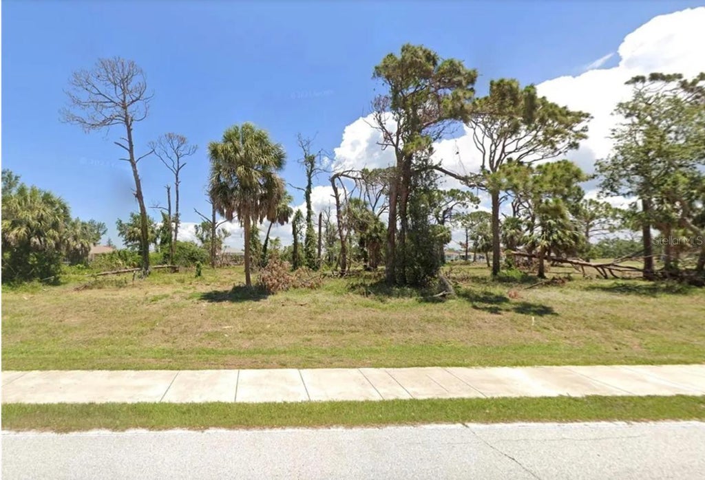 Photo of 172 Rotonda Boulevard W, Rotonda West, FL 33947 (MLS # O6451382)