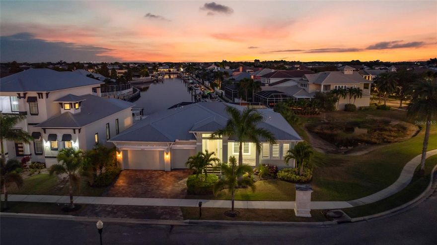 This home was built in 2023 but it lives as if it was brand new because the owners barely spent any time here, they are looking to get rid of their Florida waterfront stunner. Experience Resort-Style Living All Year in This Waterfront MiraBay Masterpiece. Discover unparalleled luxury and coastal charm in this stunning waterfront residence, perfectly situated within the highly coveted gated community of MiraBay. Blending elegance, comfort, and practicality, this exceptional home delivers the ultimate Florida lifestyle—complete with direct saltwater canal access just minutes from Tampa Bay. A boater’s paradise, the property features a private dock and boat lift, ideal for spontaneous sunset cruises or weekend adventures on the water. Step outside to your own private oasis—a custom-designed heated saltwater pool and spa accented with LED lighting and surrounded by a seamless panoramic screen enclosure that offers unobstructed water views while keeping even the smallest insects out. The expansive lanai is built for entertaining, complete with a gourmet outdoor kitchen featuring durable cabinetry, striking granite countertops, a full suite of outdoor appliances, and a Japanese teppanyaki grill—perfect for unforgettable culinary moments. A built-in kegerator with a custom dual-tap ceramic beer tower adds a playful, functional touch to this entertainer’s haven. Inside, the home showcases 4 spacious bedrooms, 3 full bathrooms, and a dedicated office with built-in cabinetry—ideal for remote work or quiet study. The open-concept kitchen serves as the heart of the home, boasting a waterfall-edge quartz island, under mount sink, and premium stainless steel appliances. Luxurious marble flooring flows throughout, complemented by soaring multi-tray ceilings with LED accent lighting for a dramatic yet inviting ambiance. The impressive pavered front porch and grand entryway set the tone for what’s inside. Retreat to the serene primary suite, where sliding glass doors open to the lanai and tranquil canal views. Remote-controlled blackout drapery ensures restful privacy, while the spa-inspired en-suite bath showcases elegant finishes and thoughtful details. Every bathroom is equipped with modern, high-end toilets featuring electric bidets. Additional upgrades include a whole-home generator, Culligan water treatment system, full irrigation, and a three-car garage with ample storage. You’ll also enjoy enhanced privacy. Smart home technology offers effortless control over pool settings, lighting, and more—making everyday living seamless. For those seeking a turnkey experience, high-end furnishings that have been barely lived in are also available for purchase, allowing you to move right in and embrace the MiraBay lifestyle.
As a MiraBay resident, you’ll have access to world-class amenities, including a state-of-the-art fitness center, luxurious clubhouse, tennis and pickleball courts, resort-style pools with waterslides, and an on-site café. Complimentary kayaks, paddleboards, and watercraft are also available for exploring the scenic canals and bay. This home isn’t just a residence—it’s a waterfront sanctuary offering an unmatched blend of sophistication and coastal living. Don’t miss this rare opportunity to own a piece of paradise in one of Apollo Beach’s most coveted communities. Schedule your private tour today and discover why MiraBay is the ultimate destination for refined Florida living.