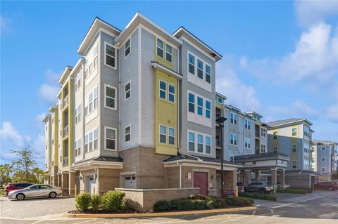 Photo of 7517 Laureate Boulevard #4103, Orlando, FL 32827 (MLS # O6285908)