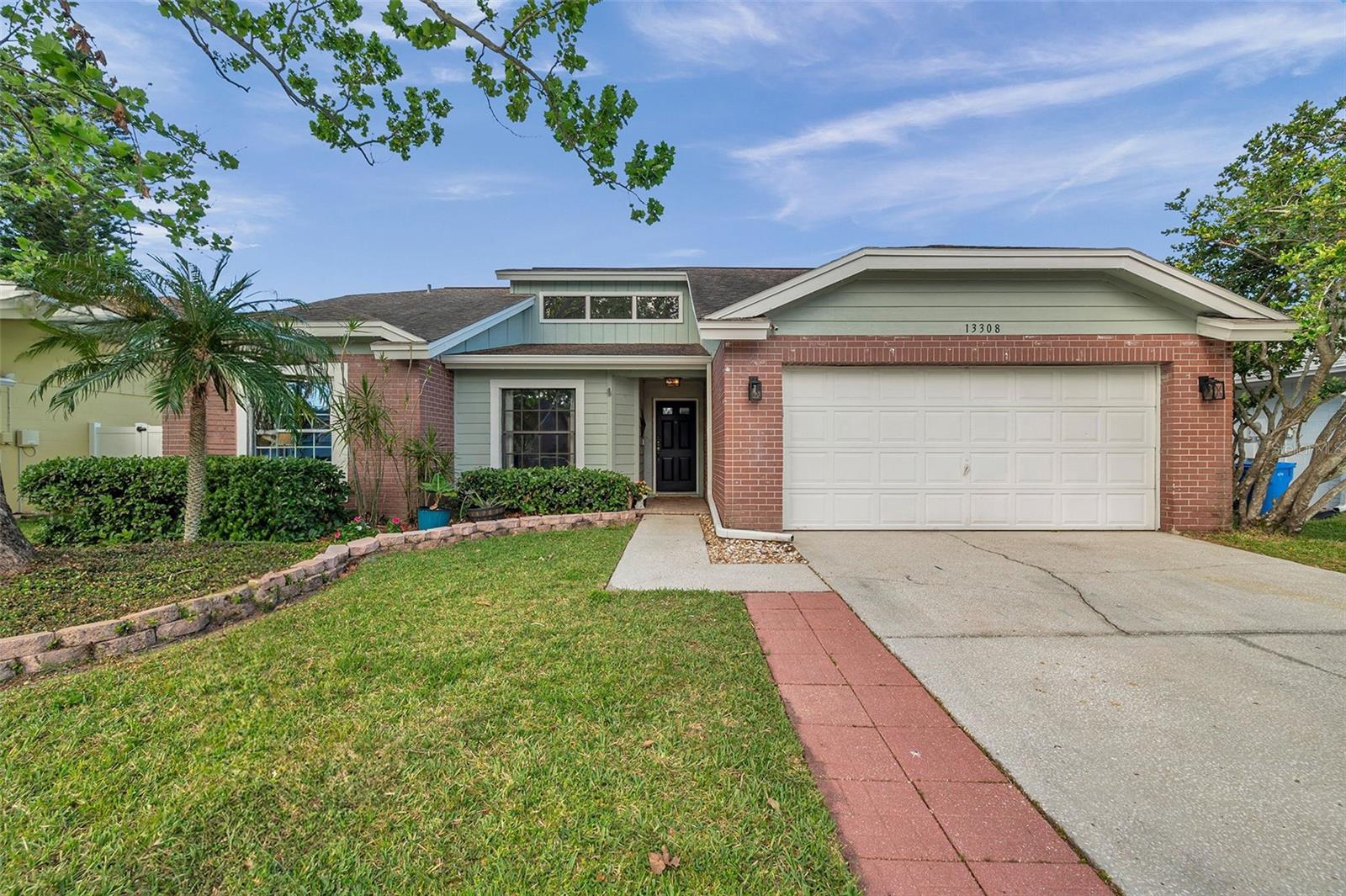 NEW ROOF! Welcome to Fawn Ridge, a highly sought-after community in the heart of Citrus Park! This beautifully remodeled four-bedroom, two-bath family home offers a perfect blend of modern comfort and timeless appeal. Featuring a neutral color palette and vaulted family room ceilings, the home exudes a sense of spaciousness and tranquility. Engineered hardwood floors flow seamlessly throughout, with brand-new tile floors in the kitchen and dining areas. Seller to put on a NEW ROOF before closing!
The charming white kitchen is a standout, equipped with stainless steel appliances, including a new large refrigerator, making it a chef’s dream. A built-in cabinetry feature in the dining room adds a touch of elegance and functionality. Enjoy your mornings on the large,
covered screened patio – the perfect spot for coffee, kids' playtime, or simply relaxing in the fresh air.
The home also offers a fenced yard for privacy and outdoor enjoyment, along with a newer electric water heater, garage refrigerator, and a high-end washer and dryer that are only two years old. Additionally, a new garage door opener ensures convenience and ease of access. This is a fantastic opportunity to own a move-in-ready home in a prime location.
Fawn Ridge is a well-maintained neighborhood offering a community park with basketball and tennis courts, a baseball field, a pavilion, a playground, and access to scenic bike paths and nature trails. This home is conveniently located near Tampa International Airport, Citrus Park Town Center, and minutes from downtown Tampa’s vibrant attractions