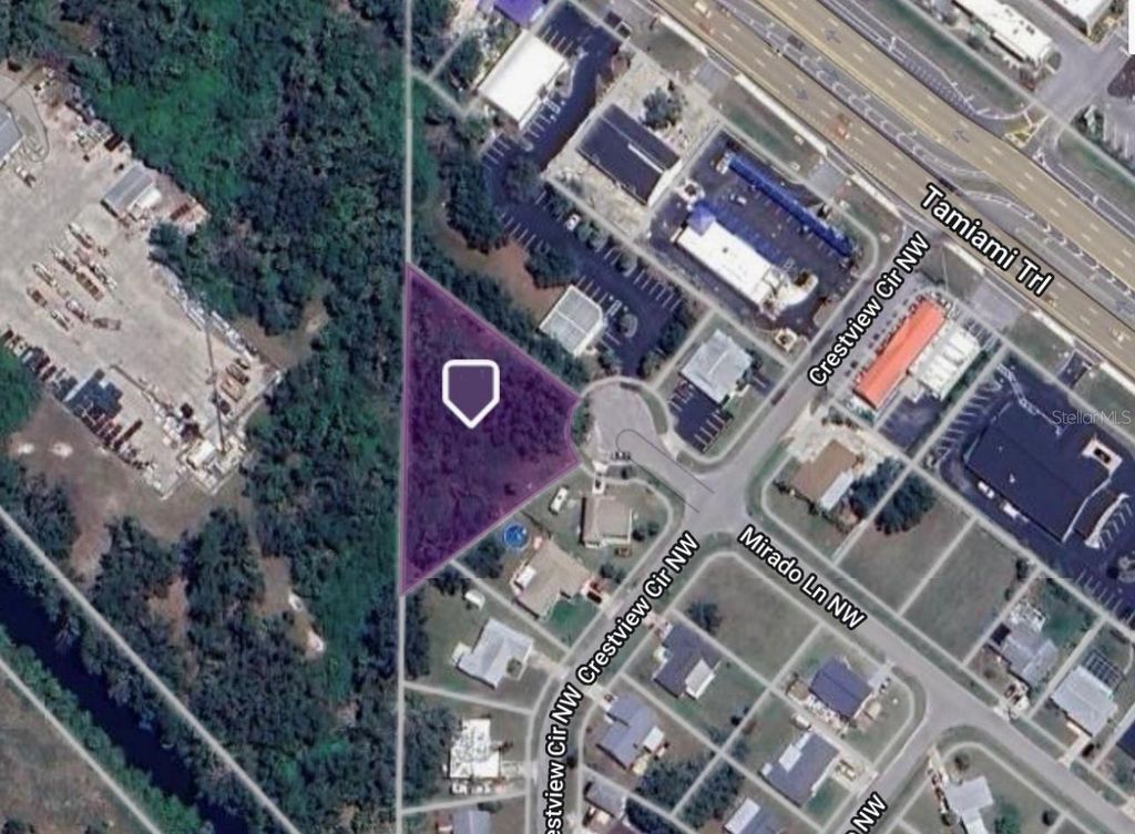 Photo of 787 Crestview Circle NW, Port Charlotte, FL 33948 (MLS # C7492670)