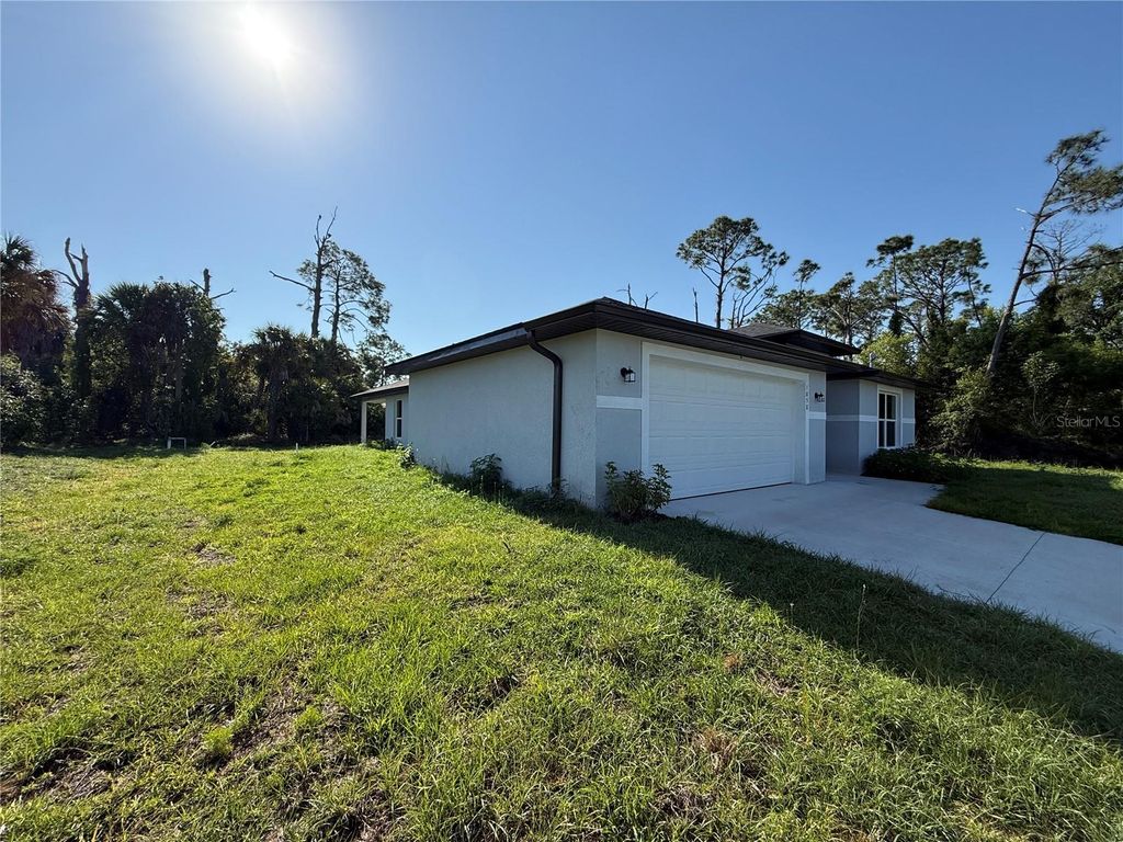 Photo of 1858 Patio Terrace, North Port, FL 34286 (MLS # A4691542)