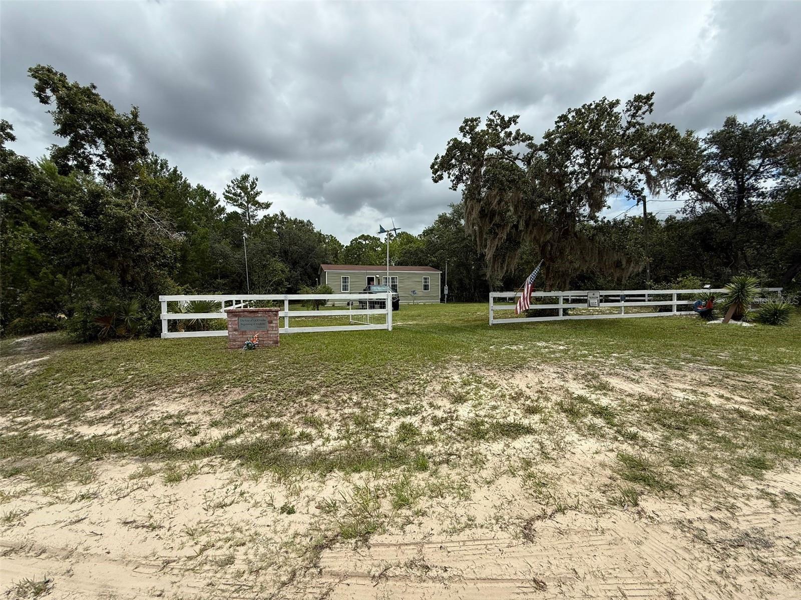 Enjoy quiet country living just under an hour from Orlando, Disney, and Universal in this well-kept 3-bedroom, 2-bath home on a private 0.6-acre lot in Eustis, FL. This spacious manufactured home features an open living area, an eat-in kitchen, and a split-bedroom layout for added privacy. The primary suite includes a walk-in closet and a full private bathroom.
The home comes fully furnished with a king-size bed, queen-size bed, and twin-size bed, along with a kitchen table, sofa couch, two bedside tables, and a living room bedside table—making moving in easy and comfortable.
Rent is $1,800/month and includes water, Wi-Fi, and lawn care, offering great value and lower monthly expenses. Central A/C and heating keep you comfortable year-round, and washer/dryer hookups are available.
The large yard is surrounded by trees, offering plenty of space to relax, garden, or enjoy the peaceful setting. With no HOA, you’re free to bring your RV, boat, or trailer. Conveniently located minutes from downtown Eustis and Mount Dora, with easy access to major roads and shopping.
This home is ideal for families, remote workers, or anyone wanting space and privacy with key utilities included.
