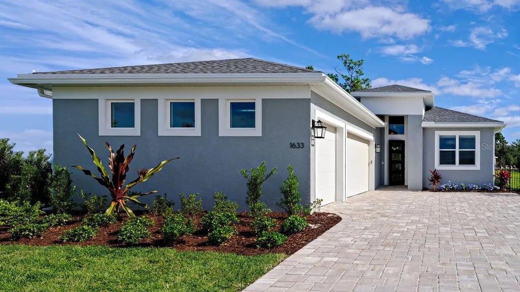 Photo of 1633 Lake Reserve Drive, Deland, FL 32724 (MLS # W7889217)