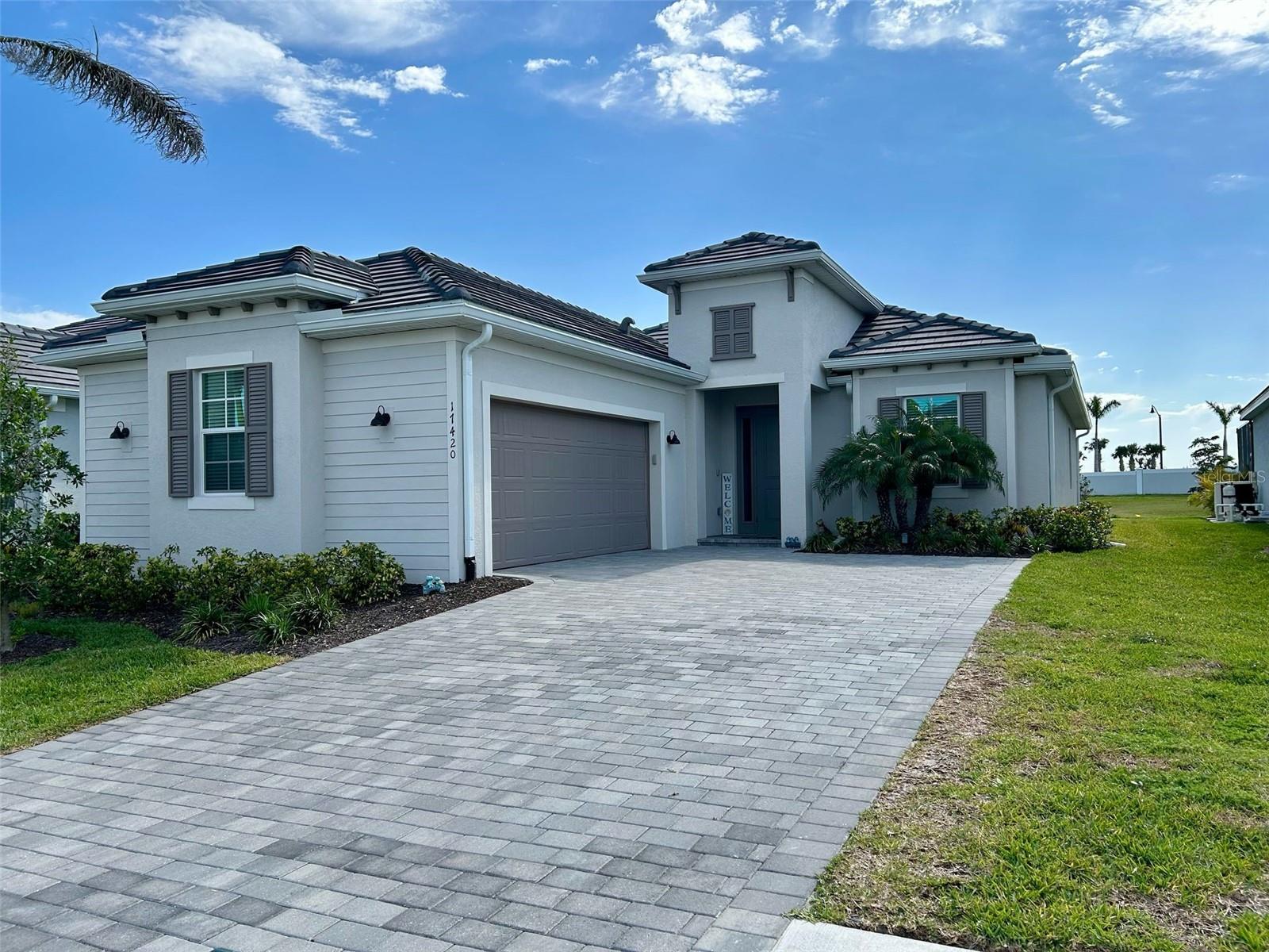 Move-In Ready Waterfront Home with deeded Golf in Wellen Park Golf & Country Club.
THIS IS THE LEAST EXPENSIVE SINGLE-FAMILY DEEDED GOLF HOME IN
WELLEN PARK. There are no more new deeded golf homes left in this community.
This beautifully upgraded Victoria Model floor plan is an open concept 1850 square foot
home. It has 2 bedrooms, office (which can be used as a 3 rd bedroom), 2.5 baths,
screened in Lanai, and a 2-car garage. This home was built less than 2 years ago and
includes many upgrades such as Quartz Countertops, Tile Floors throughout, Gutters
installed around the entire property, Laundry Room Cabinets, Sherwin Williams Acrylic
Latex Paint throughout the home, upgraded light fixtures, fans in the bedrooms and
office, custom roller shades for both sliding glass doors, epoxy garage floor, overhead
garage storage, and additional shelving in hallway closet. This home comes with world
class amenities, which include an 18 hole Championship Golf Course, Resort Pool, Tiki
Bar, Fitness Center, Pickle Ball Courts, Tennis Courts and Bocce Ball, all of which are
open now. In 2026 the Clubhouse will open which will offer fine dining.
Why Choose Wellen Park Golf & Country Club?
Prime Location – Close to the new Downtown Wellen which offers waterfront dining, boutique shopping, and year round
events. Close to the new Costco, 5 minute drive. Near World Class Beaches – Short
drive to Manasota Key, Englewood, Venice Beach, Boca Grande, and Nokomis Beach.
Active lifestyle – Dog park inside community! Scenic walking and biking trails, fitness center, and outdoor activities.
Sports and Entertainment – Home to the Atlanta Braves Spring Training Facility at Cool
Today Park. Convenience – minutes from top rates schools, health care, and easy
access to I75. Don’t miss this opportunity to own a move in ready golf home in one of
Florida’s fastest growing communities.
