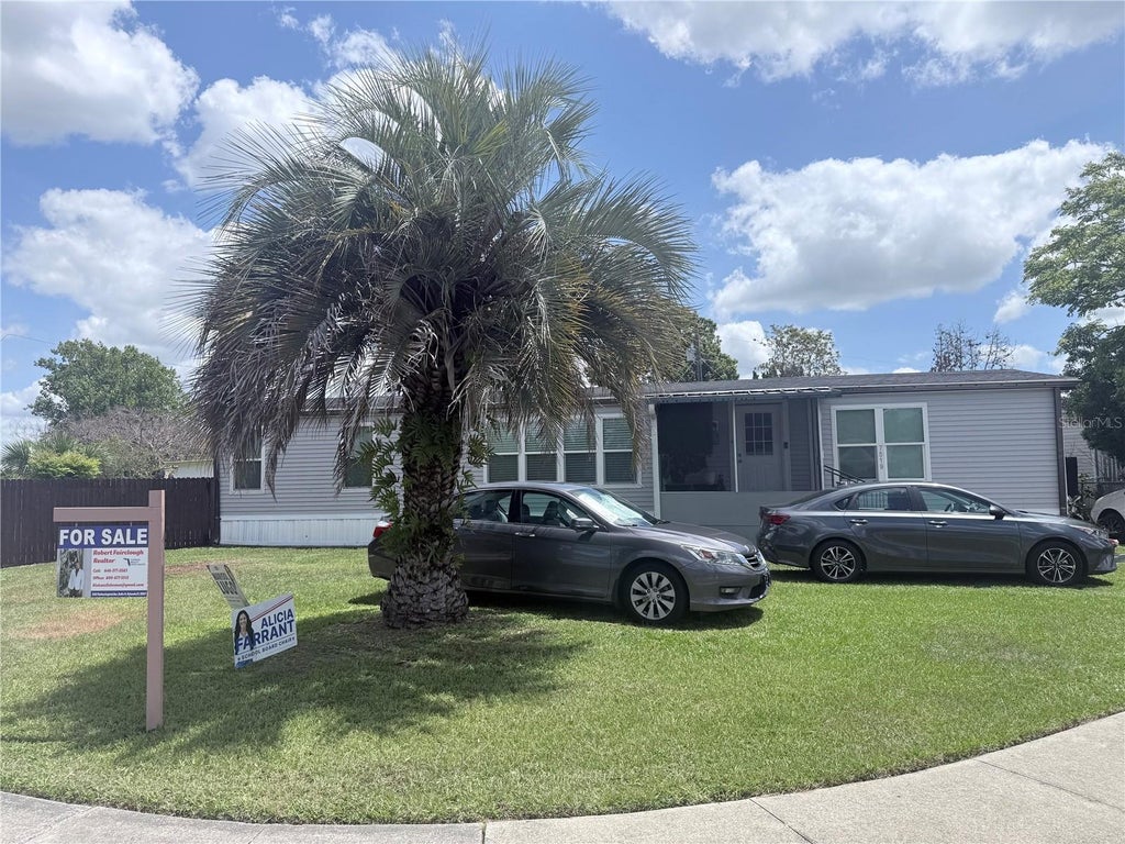Photo of 7519 Charlin Parkway, Orlando, FL 32822 (MLS # O6412295)