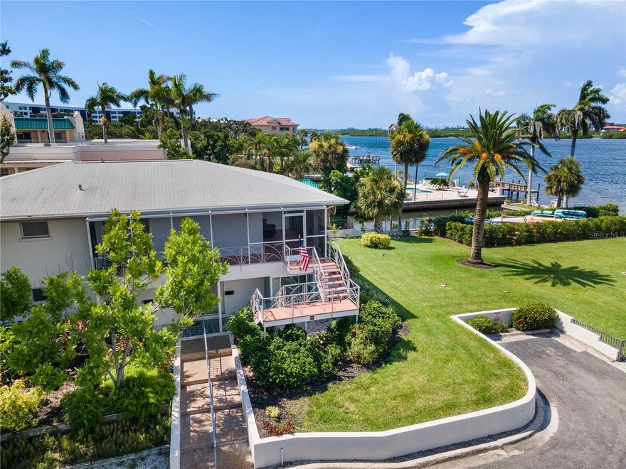 Welcome to Sunrise Porch Lookout — your peaceful intercoastal retreat in the heart of Siesta Key. This bright and tropical second-floor condo is perfectly situated in the highly sought-after Provincial Gardens community, where Old Florida charm meets serene waterfront beauty. Overlooking the intercoastal waterway and lush park-like lawn, the screened-in wraparound porch is your front-row seat to sunrise skies, drifting sailboats, and a cool morning breeze.

This one-bedroom condo offers a king bed, spacious living area, and a small but fully equipped kitchen ideal for light meals or snacks between beach outings. The interior is designed in a cheerful, nautical palette with comfy furniture, modern conveniences, and thoughtful touches throughout. Natural light pours in from windows that frame the stunning water views, creating a welcoming and relaxing space.

Guests of Sunrise Porch Lookout enjoy shared private beach and pool access via neighboring Aloha Kai — just across the street. Relax by the heated pool, explore Siesta Key on foot or by bike, and return to your porch to watch the golden hour settle over the water. With on-site parking, in-unit laundry, and beach gear provided, this getaway is as convenient as it is scenic.

Enjoy direct access to Crescent Beach, kayak the calm waters of the intercoastal, or indulge in local seafood at nearby favorites like Captain Curt’s, Big Water Fish Market, and the original Daiquiri Deck. You're just minutes from Siesta Key Village, Turtle Beach, and even downtown Sarasota via the nearby Stickney Point Bridge.

**Why Guests Love It:**
- Wake up to intercoastal water views every morning
- Peaceful, non-commercialized community with tropical landscaping
- Ideal for couples, snowbirds, and solo travelers looking to relax
- No elevators or crowds — just tranquility and sunshine

Professionally hosted & part of the SV Collection — a handpicked portfolio of unique vacation homes across Siesta Key.

Property Manager has the most updated availability calendar available.

**PLEASE NOTE** Rates vary by week/season. Additional fees and taxes apply. During the months of January, February, and March, there is a 1 month minimum rental period and check-in & check-out dates are only allowed on the first and last day of those months.
