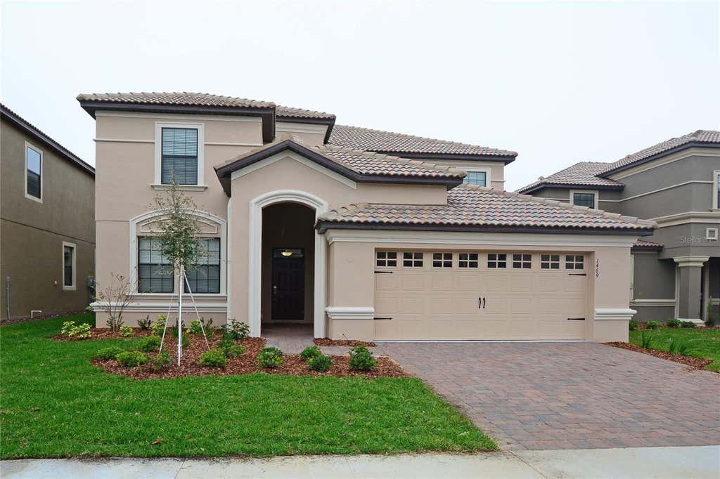Photo of 1469 Moon Valley Drive, Davenport, FL 33896 (MLS # S5154133)