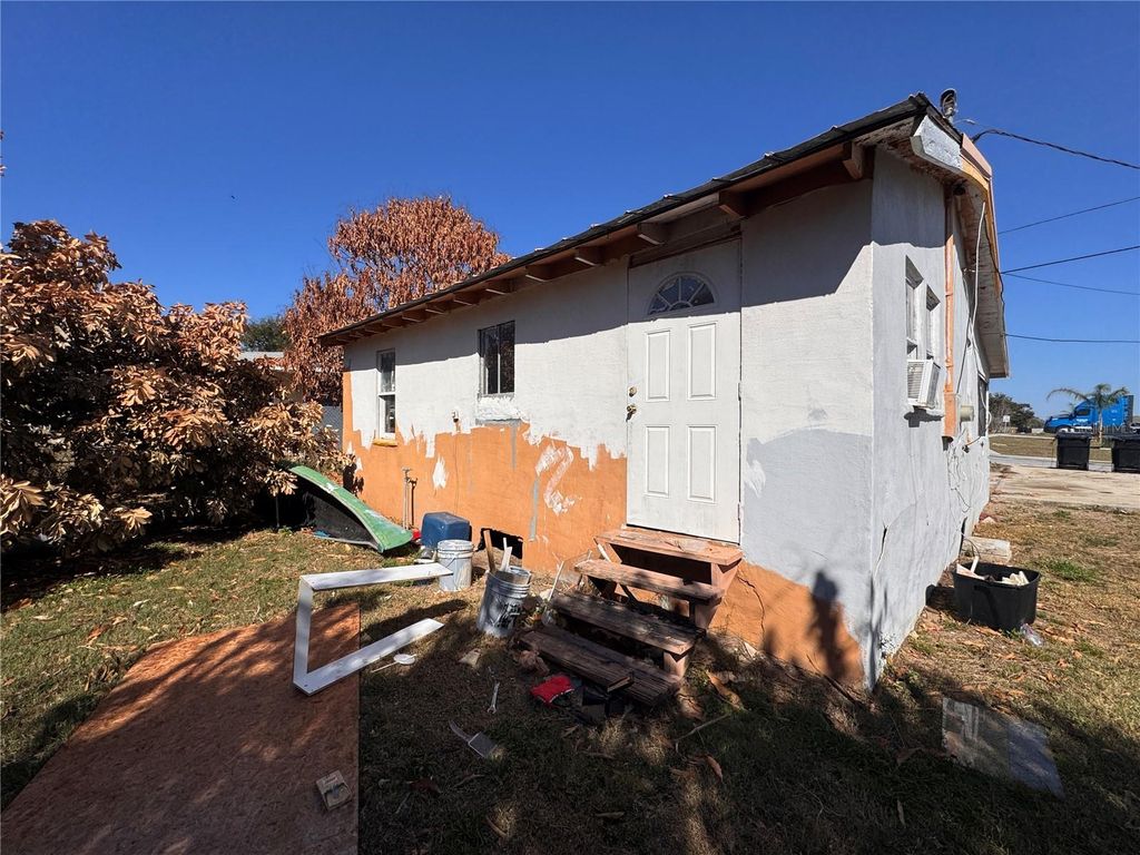 Photo of 323 W 9th Street, Frostproof, FL 33843 (MLS # S5144781)