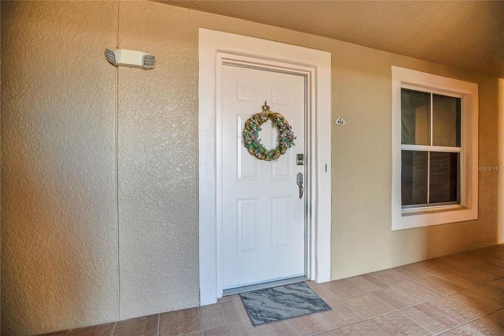 Photo of 424 Luna Bella Lane #415, New Smyrna Beach, FL 32168 (MLS # O6371725)