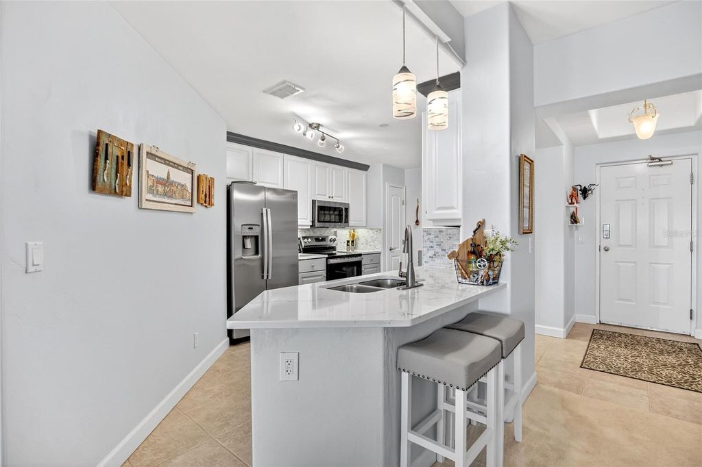 Photo of 424 Luna Bella Lane #415, New Smyrna Beach, FL 32168 (MLS # O6371725)