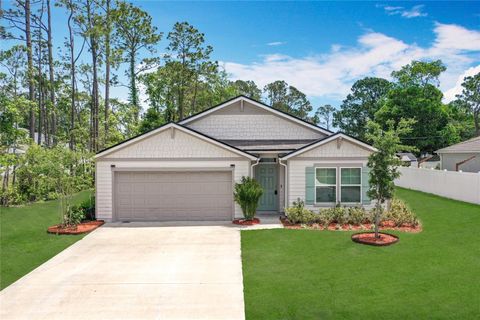 Photo of 19 Roxland Lane, Palm Coast, FL 32164 (MLS # OM700440) Photo of 19 Roxland Lane, Palm Coast, FL 32164 (MLS # OM700440)