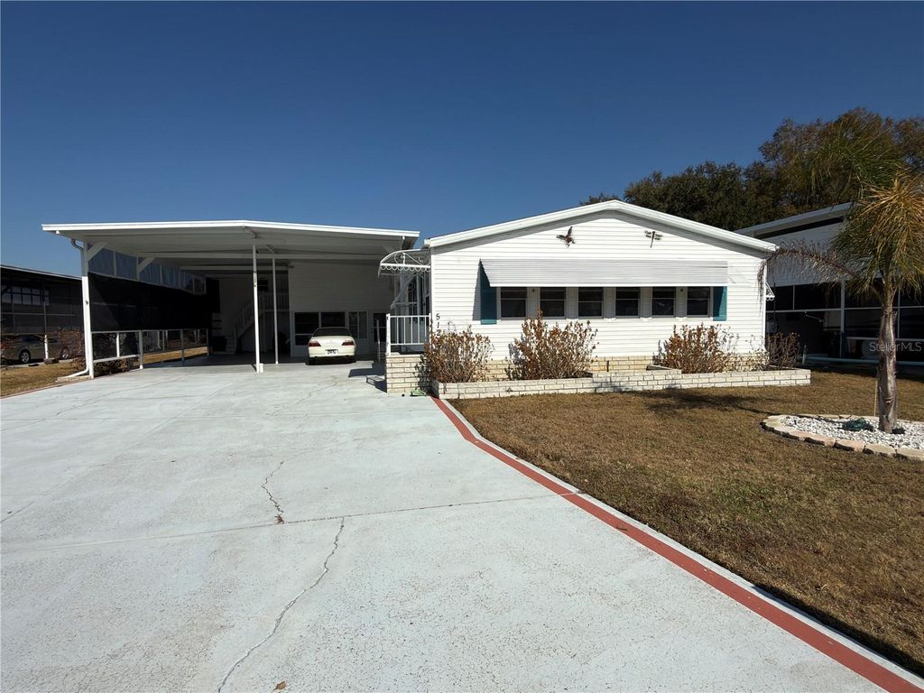 Photo of 5122 Southshore Drive, Polk City, FL 33868 (MLS # P4937746)