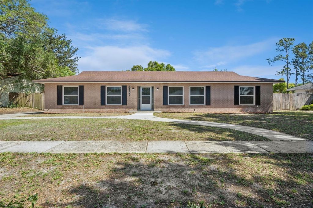 Photo of 8559 Tansy Drive, Orlando, FL 32819 (MLS # O6400467)