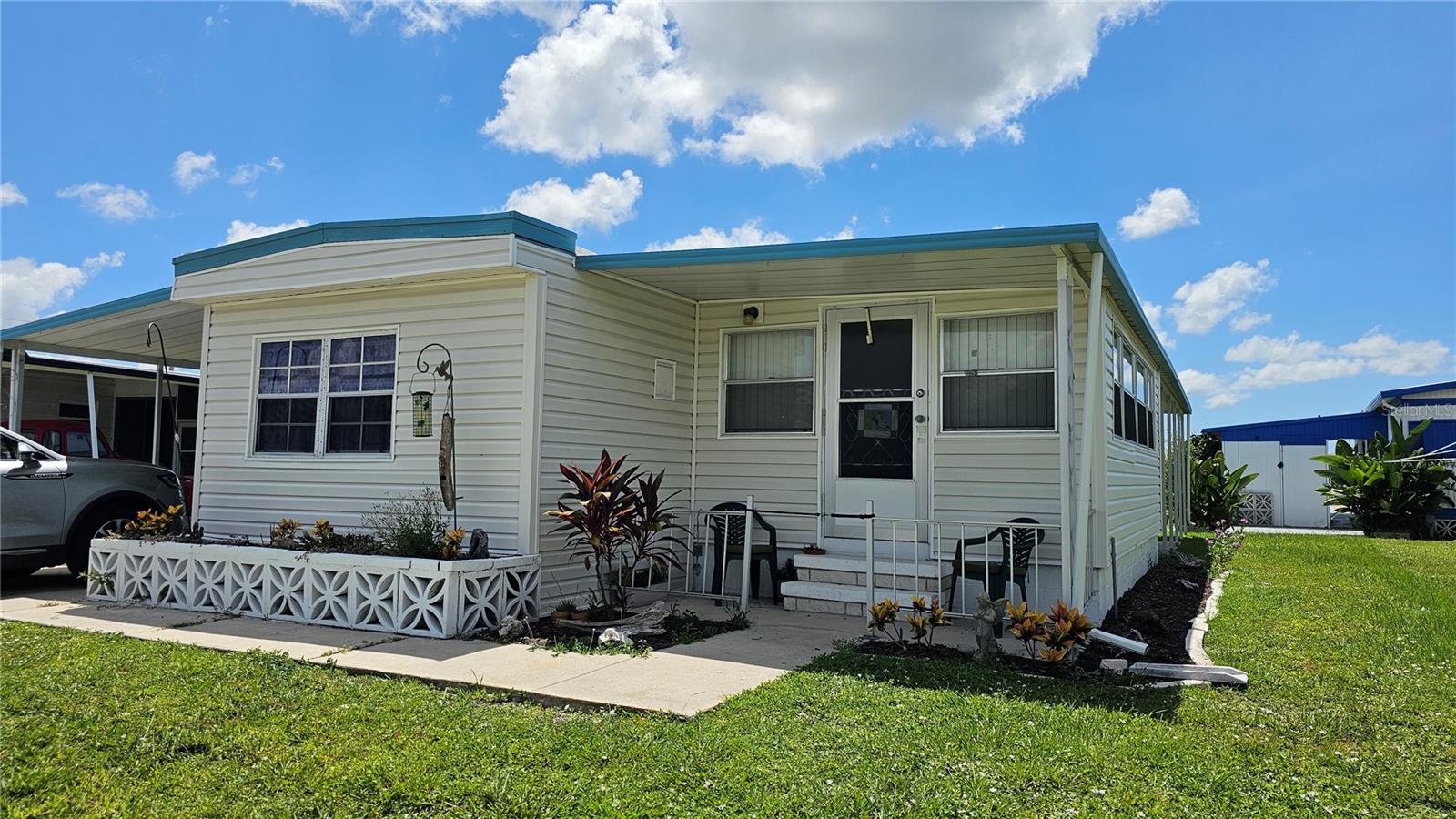 Your Florida Escape Awaits in Tidevue Estates!
Imagine waking up to warm sunshine, hopping in your golf cart, and heading to the community pool for a morning swim — all just steps from your front door. This turnkey furnished 2 bedroom, 1 bath home in the highly desirable, land-owned 55+ Tidevue Estates makes that dream a reality.
The home has been thoughtfully updated to blend style and comfort. An airy, open kitchen with soft-close cabinetry, a farmhouse sink, and newer appliances flows into bright living and dining spaces, making it perfect for entertaining visiting friends and family. Durable vinyl plank floors keep life low-maintenance, and the cozy carpeted bedrooms offer a relaxing retreat after a day in the sun.
One of the highlights? The enclosed Florida Room with its own AC — ideal for morning coffee, card games with neighbors, or simply enjoying the Florida breeze without leaving the comfort of home. There’s also a modern walk-in shower, fresh paint inside and out, and a rare inside laundry for convenience.
Outside, a spacious carport holds multiple vehicles, and a large shed is perfect for hobbies or storage. A covered patio in back offers a peaceful place to relax, read a book, or host a barbecue.
Tidevue Estates is more than a neighborhood — it’s a community with endless activities: swim in the solar-heated pool, join the golf league, play indoor pickleball, bocce, or shuffleboard, or explore nearby Veteran’s Park. Shopping, dining, medical facilities, and Ellenton Premium Outlets are just minutes away, with Sarasota, St. Armand’s Circle, and world-famous Gulf beaches within easy reach.
No pets permitted. Whether you’re looking for a seasonal escape or a full-time Florida lifestyle, this home has it all.