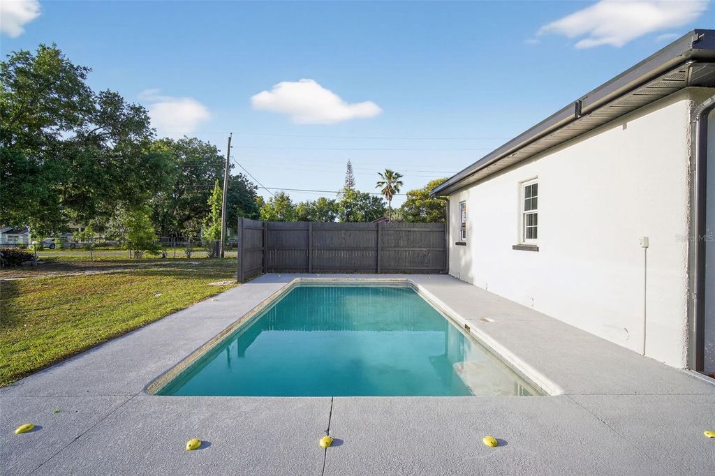 Photo of 305 Hennessee Street, Lakeland, FL 33805 (MLS # O6396659)