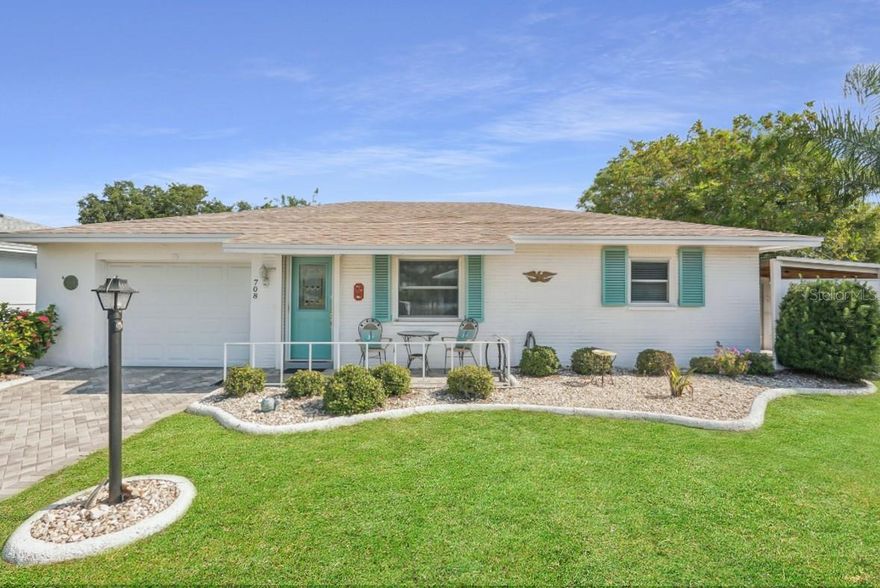 Experience the best of carefree Florida living in the vibrant 55+ community of Sun City Center. This beautifully updated 2-bedroom, 1.5-bath residence offers approximately 1,200 square feet of comfort and style—and lives like a single-family home, but with the benefits of condominium ownership. The low monthly condo fee of just $150 covers water, sewer, and grounds maintenance, offering exceptional value and convenience. From the moment you arrive, you’ll appreciate the inviting curb appeal featuring a brick paver driveway and walkway (installed in 2018, resealed in 2023). The extra-wide, single-car epoxy garage includes a retractable screen door (added 2021) and new opener. The roof was replaced in 2015, and a dedicated golf cart enclosure makes community travel effortless. Inside, enjoy a light, neutral color palette with crown molding, textured ceilings, and laminate flooring (installed 2017). The spacious kitchen features attractive cabinetry, tile countertops, Whirlpool stainless steel SMART appliances (2018), and a brand-new microwave. The owner’s suite offers a private bath with a tiled walk-in shower (2019) and upgraded shower door (2024). The enclosed 12x12 glass sunroom—added in 2018 and under air—is hurricane-rated and offers peaceful views of the natural area and golf course behind the home. Additional upgrades include a newer A/C system (2021) with service plan (2023), updated electrical panel (2017), re-piped plumbing, newer water heater (2015), and hurricane shutters throughout. Located in the heart of Sun City Center, this golf cart community has plenty of shopping, dining, social clubs, and recreation facilities. With SCCCA access to both Central and South Campus Amenities, there is always something to do! This home provides easy access to major highways, Tampa, Sarasota, and Gulf Coast beaches. No flood insurance required. Enjoy single-family comfort with the ease of condo living—schedule your private tour today!