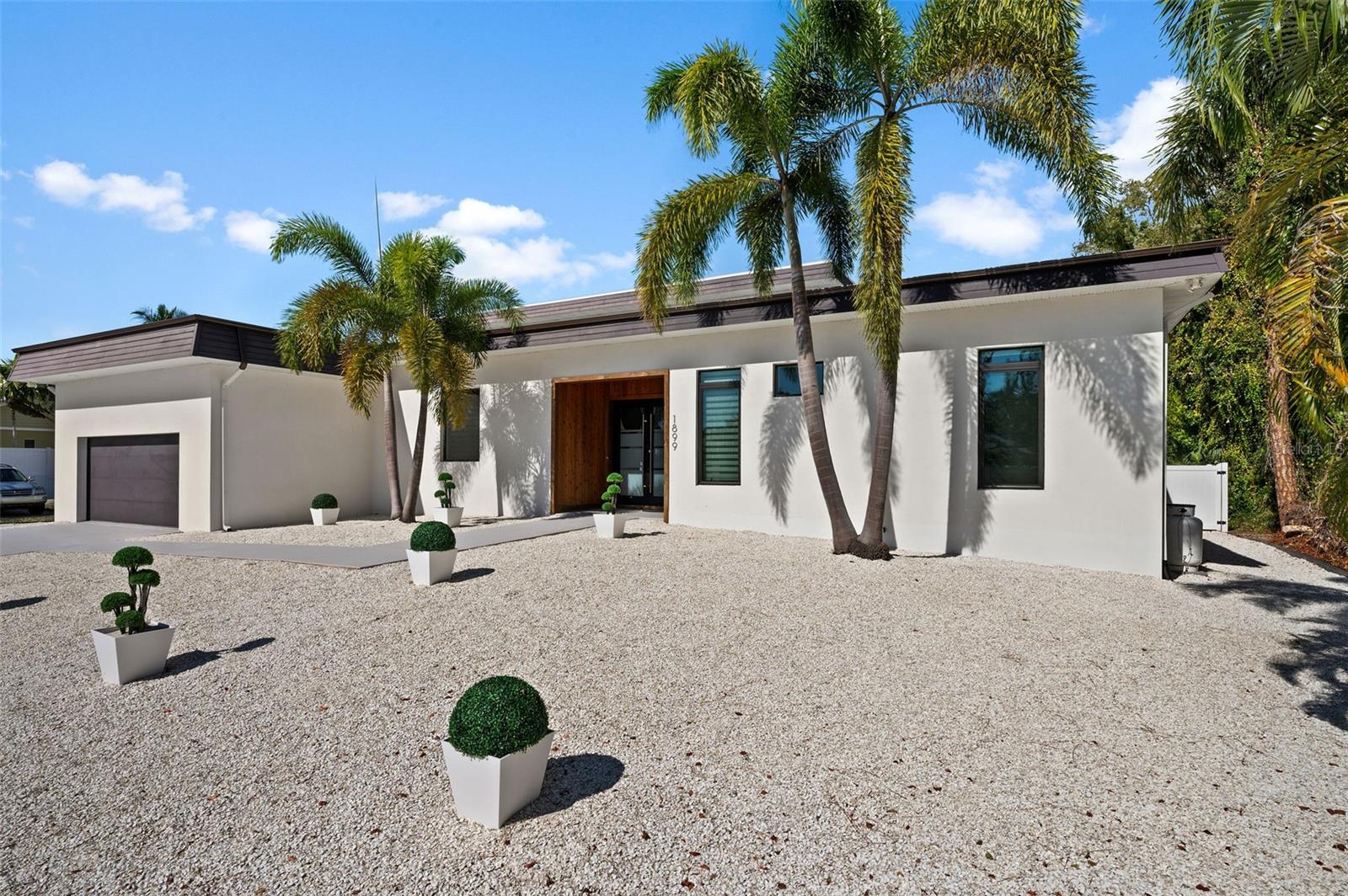 The property can be rented for a short or long term. Property AVAILABLE from SEPTEMBER 1,2025. Rent per month as follows:
$6500 for September 1- October 31,2025 and $10,500 for November 1,2025 -April 30, 2026.
***Please ask the Listing Agent for more details***
Beautifully crafted and maintained, this remarkable Sarasota custom-built home! FULLY FURNISHED by MM Modern Miami, there’s nothing left to do but move in and savor the lifestyle that awaits within this refurbished modern haven. Through the glass-inlaid double doors, discover a captivating, sun-soaked interior where crisp white tones, soaring ceilings, and gorgeous wide-plank flooring are on show. An elegant brick FIREPLACE warms the seamlessly flowing entertainment areas, featuring curated sculptures by renowned artists like Andrea Giorgi and Paul Bielec. Expansive glass sliders inspire vibrant indoor/outdoor celebrations, inviting you poolside after a sumptuous meal or hearthside games. An open-concept chef’s kitchen beckons with its top-of-the-line appliances, abundant cabinetry, an oversized walk-in pantry, and gleaming quartz countertops that extend to the multi-seater island. Movie buffs will love the state-of-the-art CINEMA ROOM where you can enjoy streaming shows in ultimate comfort. Equal parts form and function, the well-sized private retreats offer a restful escape after a long day, accommodated by exquisitely redesigned baths that feature an imported Maciej Zien European tile collection. Double doors reveal an unparalleled primary suite that pampers you with lanai access, a boutique-like wardrobe, and an ensuite exuding luxury at every turn. Fun and leisure abound as additional, recently installed recreational amenities flow outside with an alfresco dining area, a built-in BBQ grill, a pristine HUGE SALT POOL, a HOT TUB , and SPORTS COURTS sports for BASKETBALL and PICKLEBALL . New lush landscaping dotted with towering palms enhances the picturesque FULLY FENCED YARD and an attached 2-car garage. Siesta Key offers an array of activities, from water sports and boating to shopping and dining at charming local spots. Embrace the island's vibrant arts and culture scene, explore nearby parks and nature reserves, or simply revel in the beauty of the Gulf of Mexico. Your piece of paradise is waiting! Cleaning Fee $300.***Make sure you see the Virtual Tour***NO PETS ALLOWED.