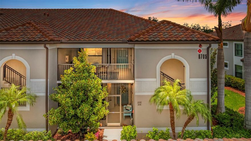 Experience Florida living at its finest in this beautifully maintained, GOLF-INCLUDED top-floor ABBEY model, offered fully turnkey. Located in the sought-after River Strand Golf & Country Club, this light-filled end unit offers the perfect blend of comfort, style, and convenience in a maintenance-free setting. Enjoy both morning sunrises and evening sunsets from your two private screened lanais. Inside, you’ll find vaulted ceilings, crown molding, granite countertops, solid wood cabinetry, stainless steel appliances, and a detached garage. The diagonally-laid porcelain tile flooring extends seamlessly to the lanai, enhancing the home’s open flow.

The spacious owner’s suite boasts two walk-in closets, a spa-like bath with dual sinks, a garden tub, and a separate shower. A versatile den with French doors and a Murphy bed provides ideal space for guests or a home office. Additional features include high-impact windows and doors for peace of mind, a laundry room with built-in cabinetry, and a thoughtful open-concept design perfect for entertaining.

As a River Strand resident, your ownership includes full Country Club Membership with access to the 39,000 sq. ft. Tuscan-inspired clubhouse, 27 holes of Arthur Hills–designed championship golf, on-site dining, a tennis center with 8 Har-Tru lighted courts, pickleball courts, two fitness centers, heated resort-style pools, a resistance pool, and multiple satellite pools. Memberships can also be transferred to seasonal renters, making this a strong income opportunity. Located just minutes from shopping, dining, cultural attractions, and world-famous Gulf beaches, this turnkey home is truly move-in ready—just bring your suitcase and start enjoying the ultimate lock-and-leave lifestyle.