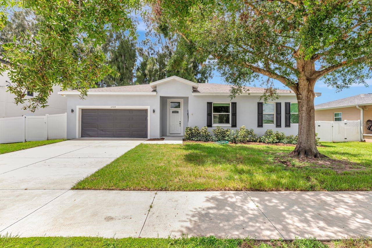 Welcome to Your Nearly New Dream Home in the Heart of Largo!
Built in 2022 and barely lived in, this beautiful one-story home offers modern design, functional layout, and unbeatable convenience. Featuring 3 bedrooms, 2 bathrooms, and 1,600 square feet of open living space, this move-in-ready home is the perfect blend of comfort and style.
The kitchen is a true centerpiece, boasting a large island with seating for four, custom gray cabinetry, stone countertops, a vented hood, and stainless steel appliances. Whether you're enjoying a casual meal at the island or hosting in the eat-in kitchen/dining area, this space is designed to impress.
Luxury vinyl plank flooring runs throughout the home, and the split-bedroom floor plan ensures privacy for the spacious primary suite, which features dual sinks and a step-in shower. There are 2 other spacious bedrooms on the other side of the home that share a full bathroom.
Enjoy indoor-outdoor living with a screened-in lanai and fully fenced backyard — ideal for relaxing or entertaining. The 2-car attached garage offers ample storage and convenience.
Located in Largo’s Central Business District, you're just 20 minutes from world-class beaches, the airport, and close to shopping, restaurants, and entertainment.
Don’t miss out on this like-new home in one of Largo’s most desirable and central locations!