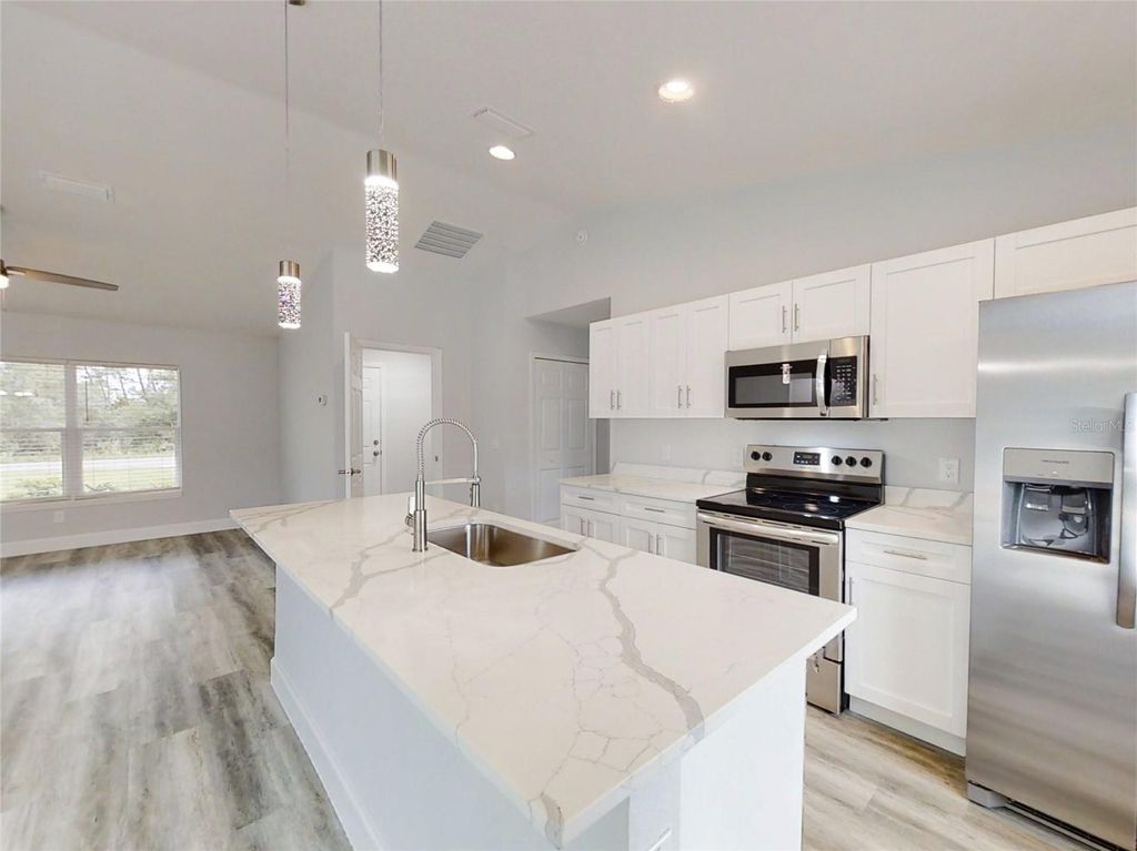 Photo of 3022 SW 168th Loop, Ocala, FL 34473 (MLS # OM718046)