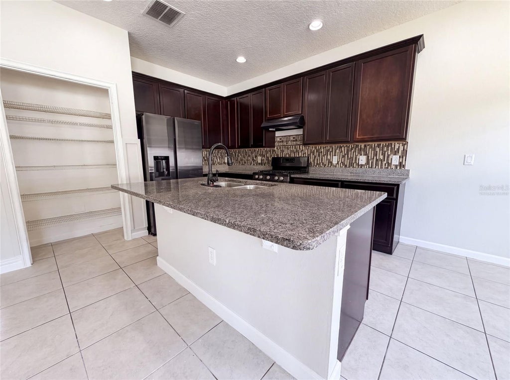Photo of 881 Haring Lane, Mount Dora, FL 32757 (MLS # O6431640)
