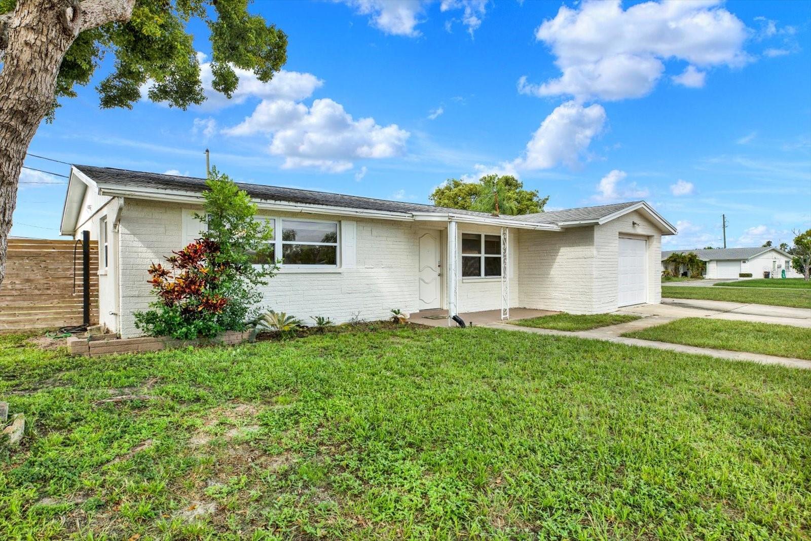 Bring all your outdoor toys to 1313 Chancellor Drive! Plenty of RV and boat/other parking available here! And best of ALL is no HOA!
2-bedroom, 1 1/2-bath home in a prime location just minutes from Gulf beaches, parks, and shopping. This home features a spacious open floor plan, a bright kitchen with modern finishes, and a comfortable primary suite with private bath. The Florida room is perfect for entertaining and has it's own AC unit for efficiency. The additional bedrooms are versatile, perfect for guests, a home office, or hobbies. Newer water heater, roof and HVAC.
Step outside to enjoy a fenced backyard ideal for entertaining or simply relaxing in the Florida sunshine. With an attached garage and excellent curb appeal, this home is move-in ready.
Located near Anclote Gulf Park, Key Vista Nature Park, Tarpon Springs Sponge Docks, and Fred Howard Park & Beach, you’ll enjoy endless options for outdoor fun, dining, and entertainment. Convenient access to US-19 makes commuting to Tampa, Clearwater, or St. Petersburg a breeze.
Don’t miss out—schedule your private showing today and make this Holiday home yours!