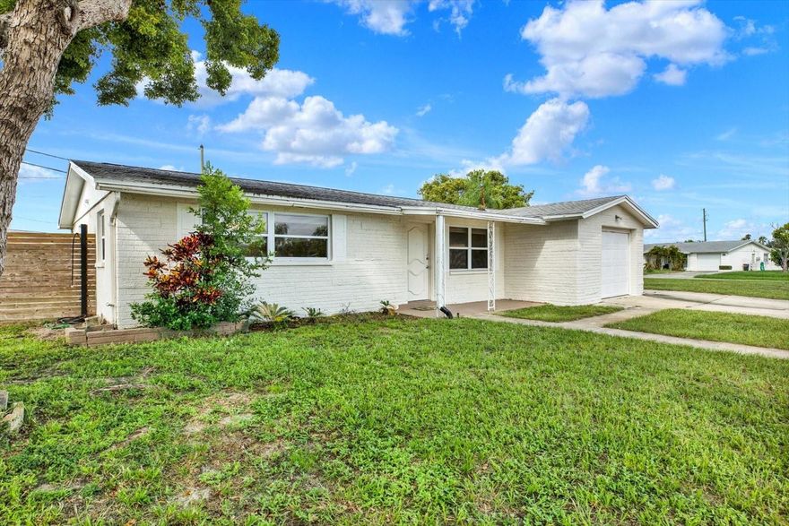 Bring all your outdoor toys to 1313 Chancellor Drive! Plenty of RV and boat/other parking available here! And best of ALL is no HOA! 
2-bedroom, 1 1/2-bath home in a prime location just minutes from Gulf beaches, parks, and shopping. This home features a spacious open floor plan, a bright kitchen with modern finishes, and a comfortable primary suite with private bath. The Florida room is perfect for entertaining and has it's own AC unit for efficiency. The additional bedrooms are versatile, perfect for guests, a home office, or hobbies. Newer water heater, roof and HVAC.

Step outside to enjoy a fenced backyard ideal for entertaining or simply relaxing in the Florida sunshine. With an attached garage and excellent curb appeal, this home is move-in ready.

Located near Anclote Gulf Park, Key Vista Nature Park, Tarpon Springs Sponge Docks, and Fred Howard Park & Beach, you’ll enjoy endless options for outdoor fun, dining, and entertainment. Convenient access to US-19 makes commuting to Tampa, Clearwater, or St. Petersburg a breeze.

Don’t miss out—schedule your private showing today and make this Holiday home yours!