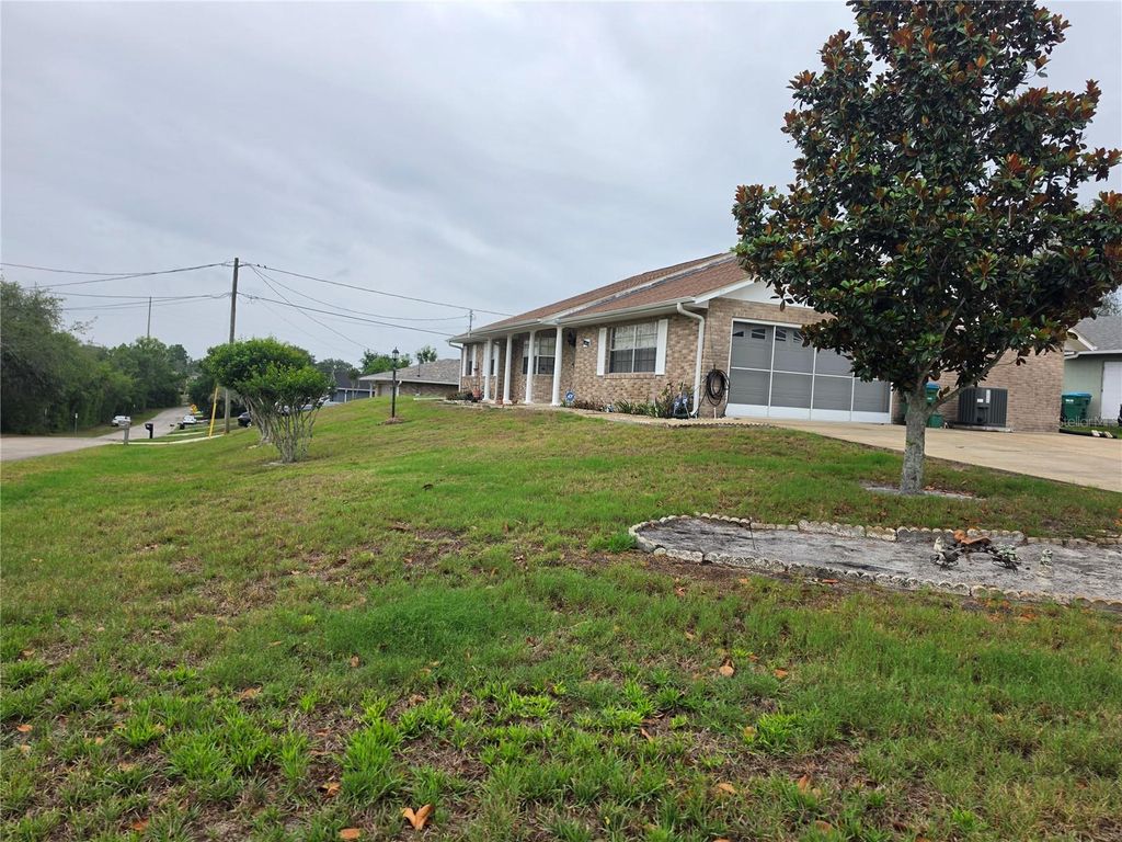 Photo of 1732 Topaz Terrace, Deltona, FL 32725 (MLS # V4949137)
